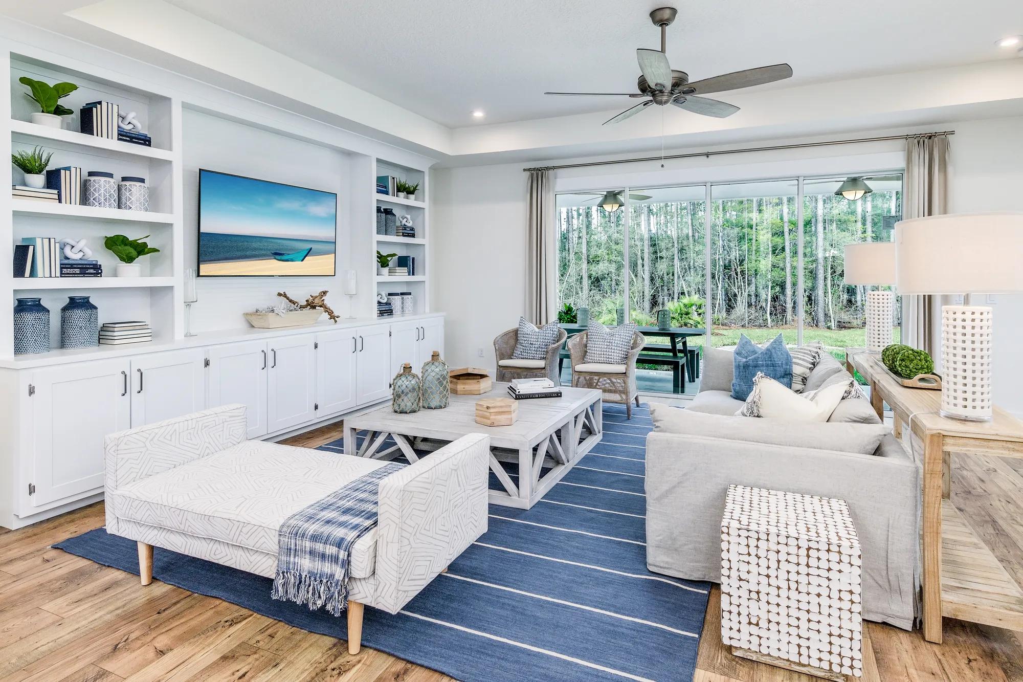 family room with built-in book shelves