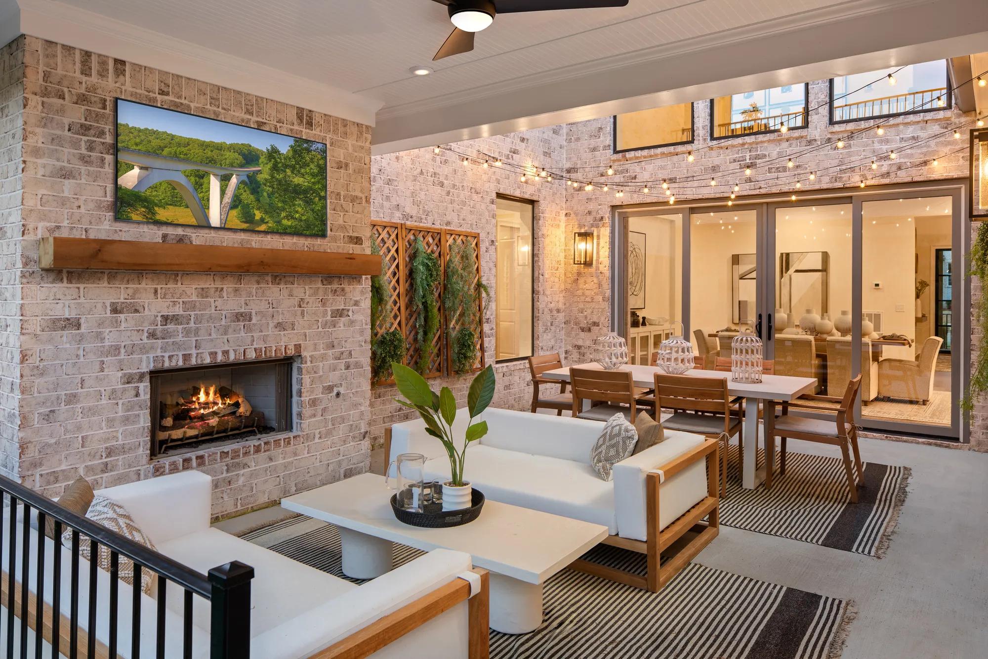 covered patio with fireplace