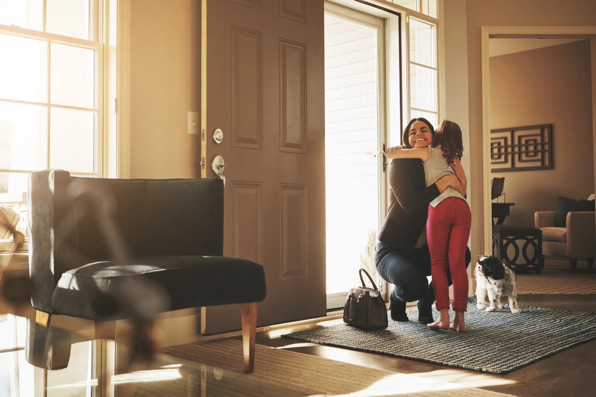 Mother and daughter in home