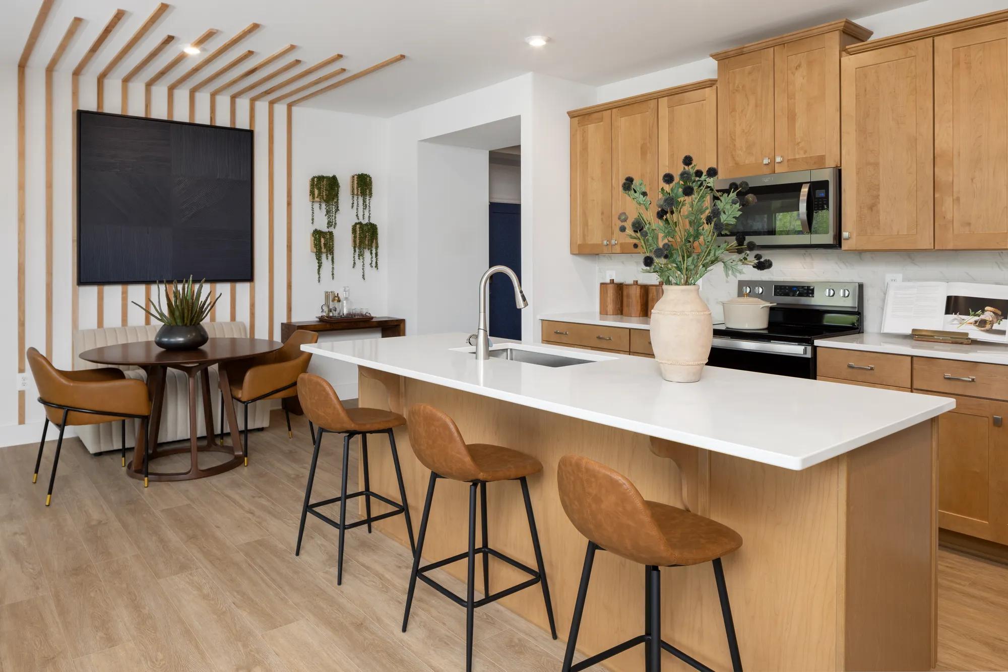 new kitchen with island and dining area