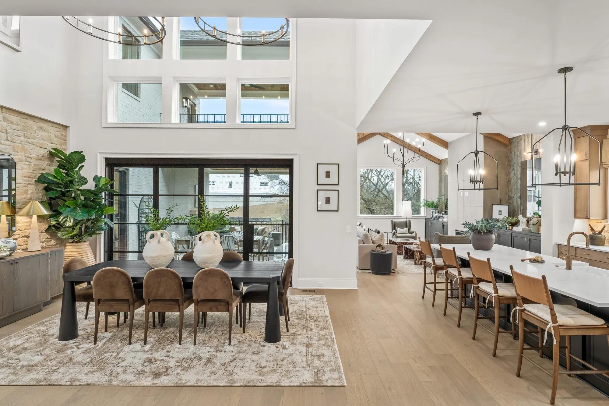 Custom home two-story dining room with open floor plan