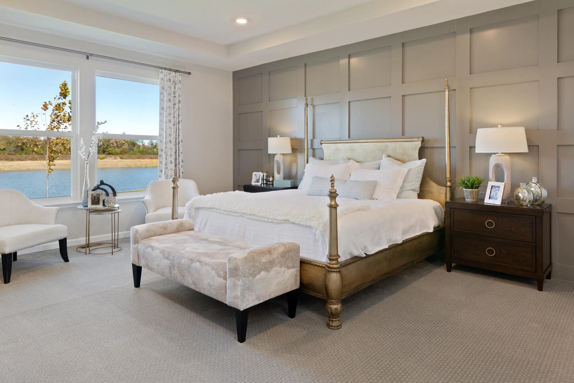 Primary Suite with gray accent wall