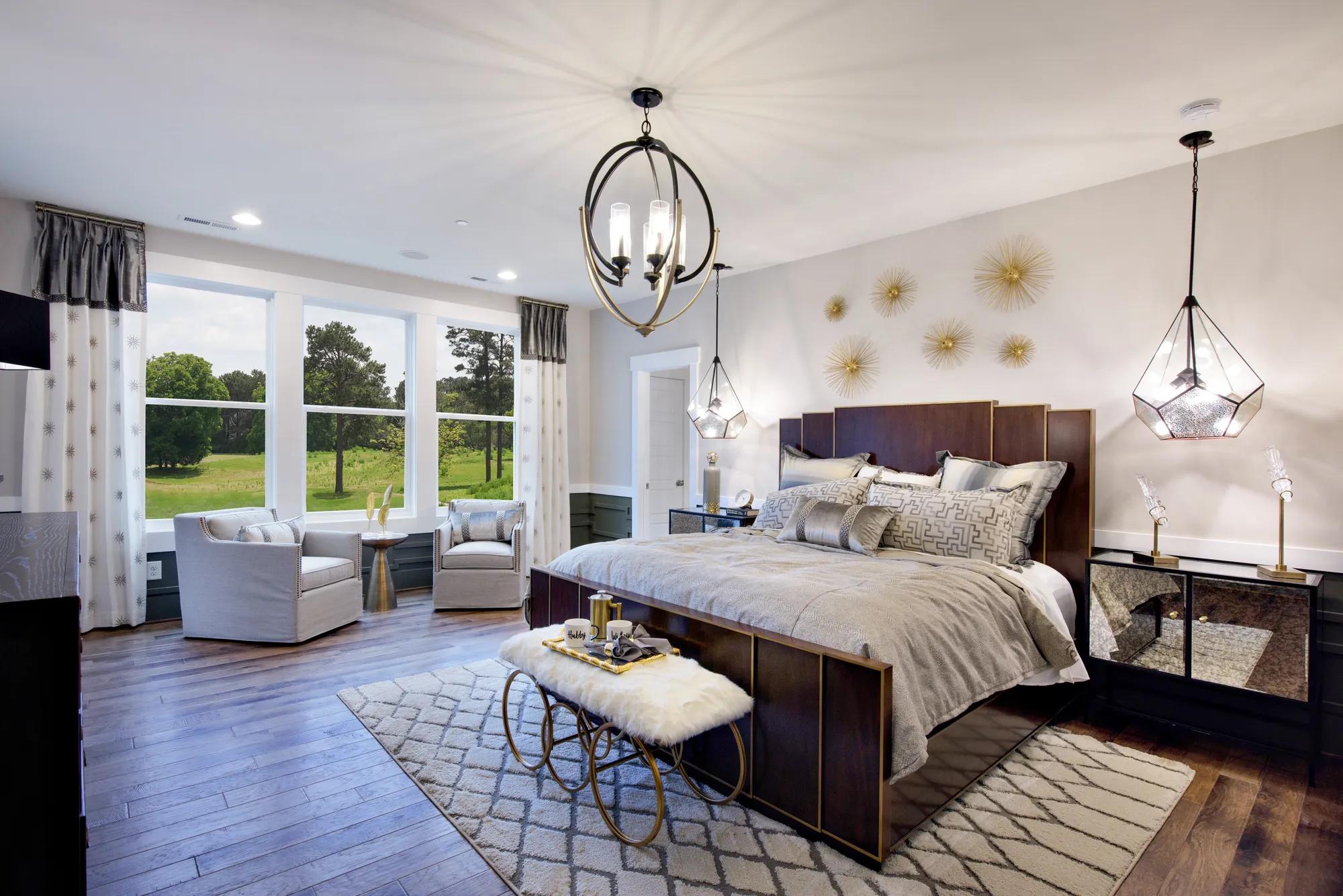 Primary Suite with sitting area and hardwood floors