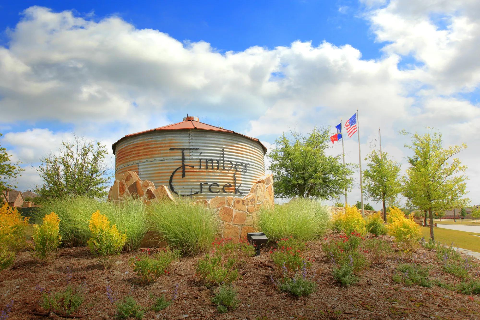 community entrance with water tower