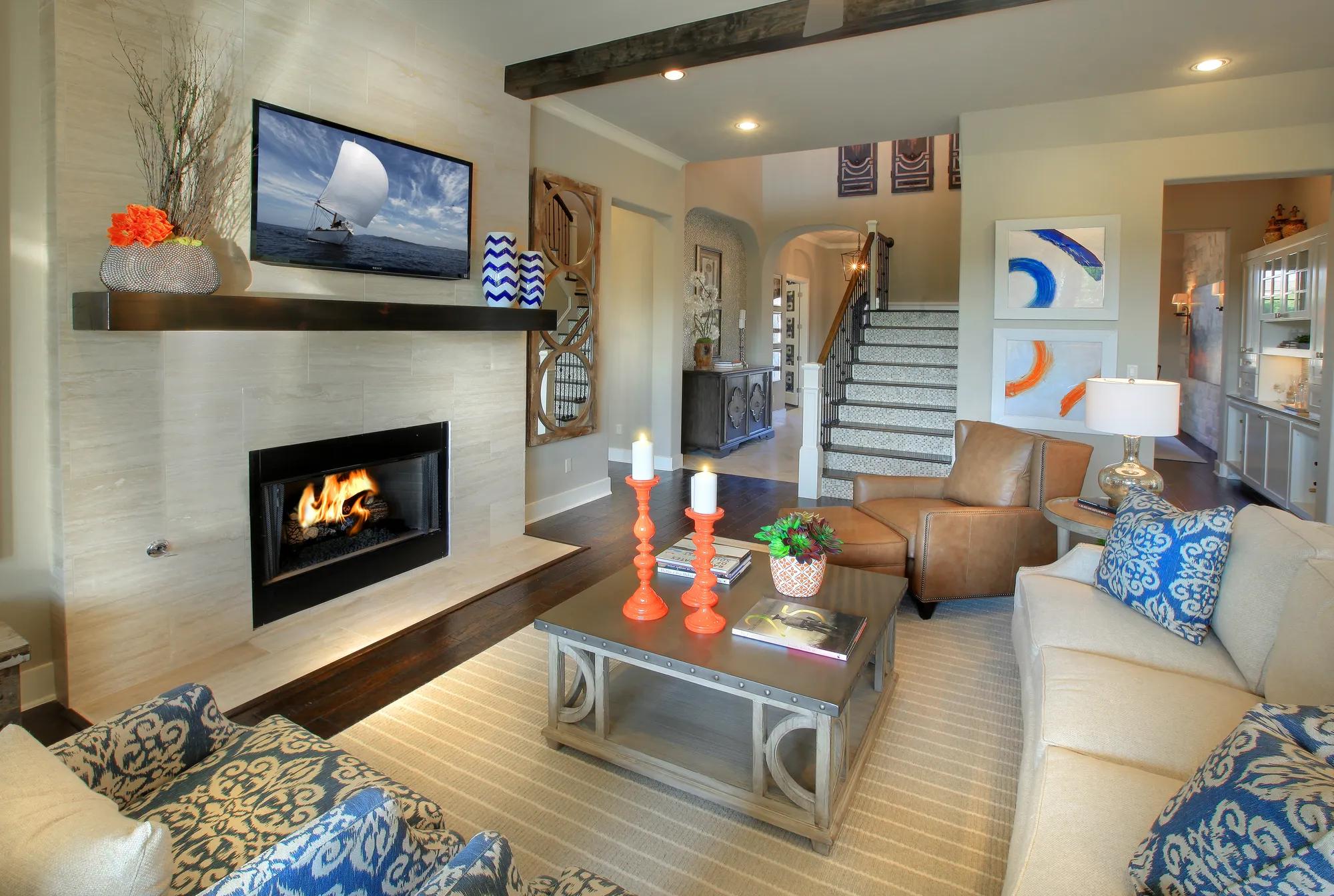Open concept family room with beam ceiling