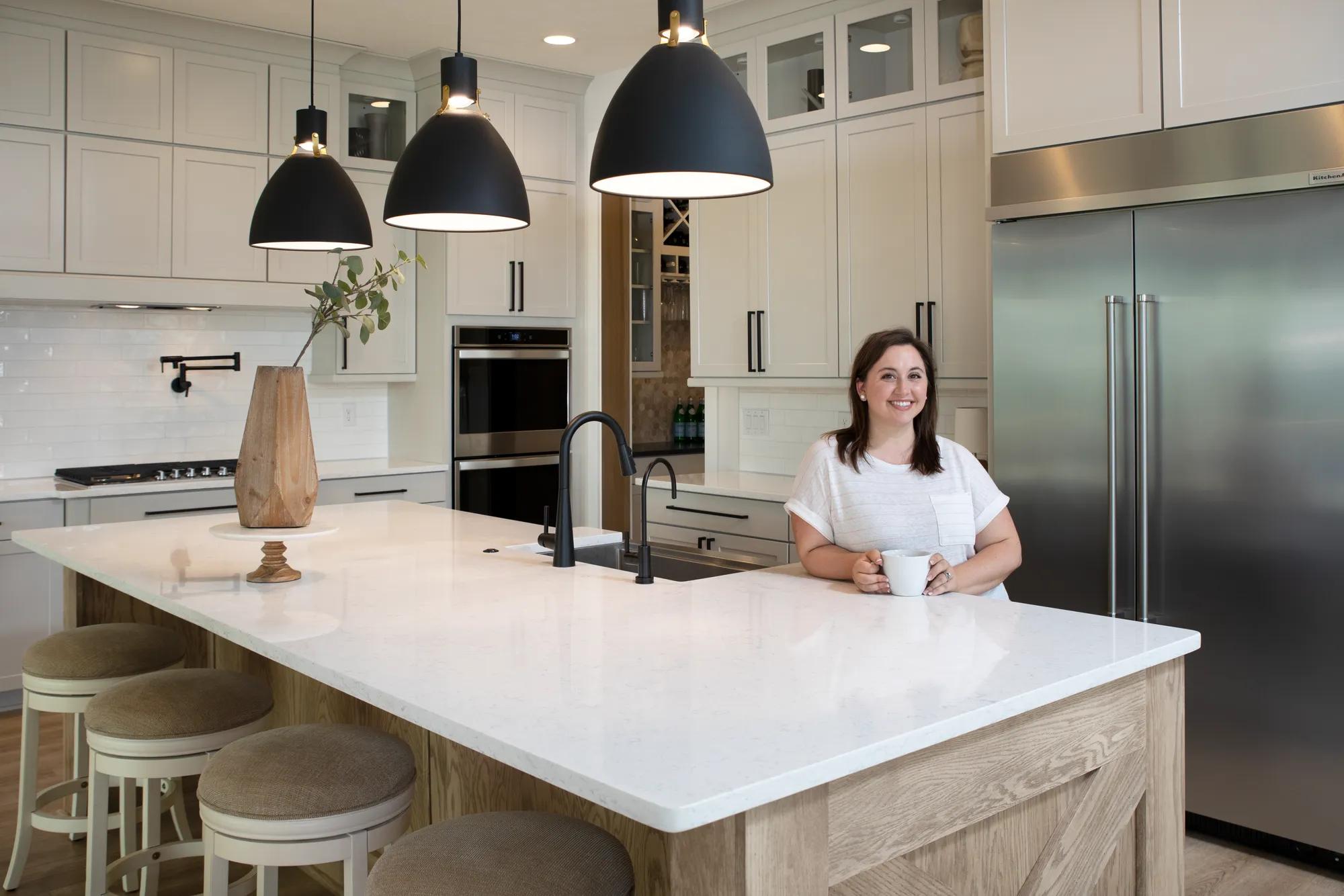 New homeowner enjoying the gorgeous marble counter kitchen