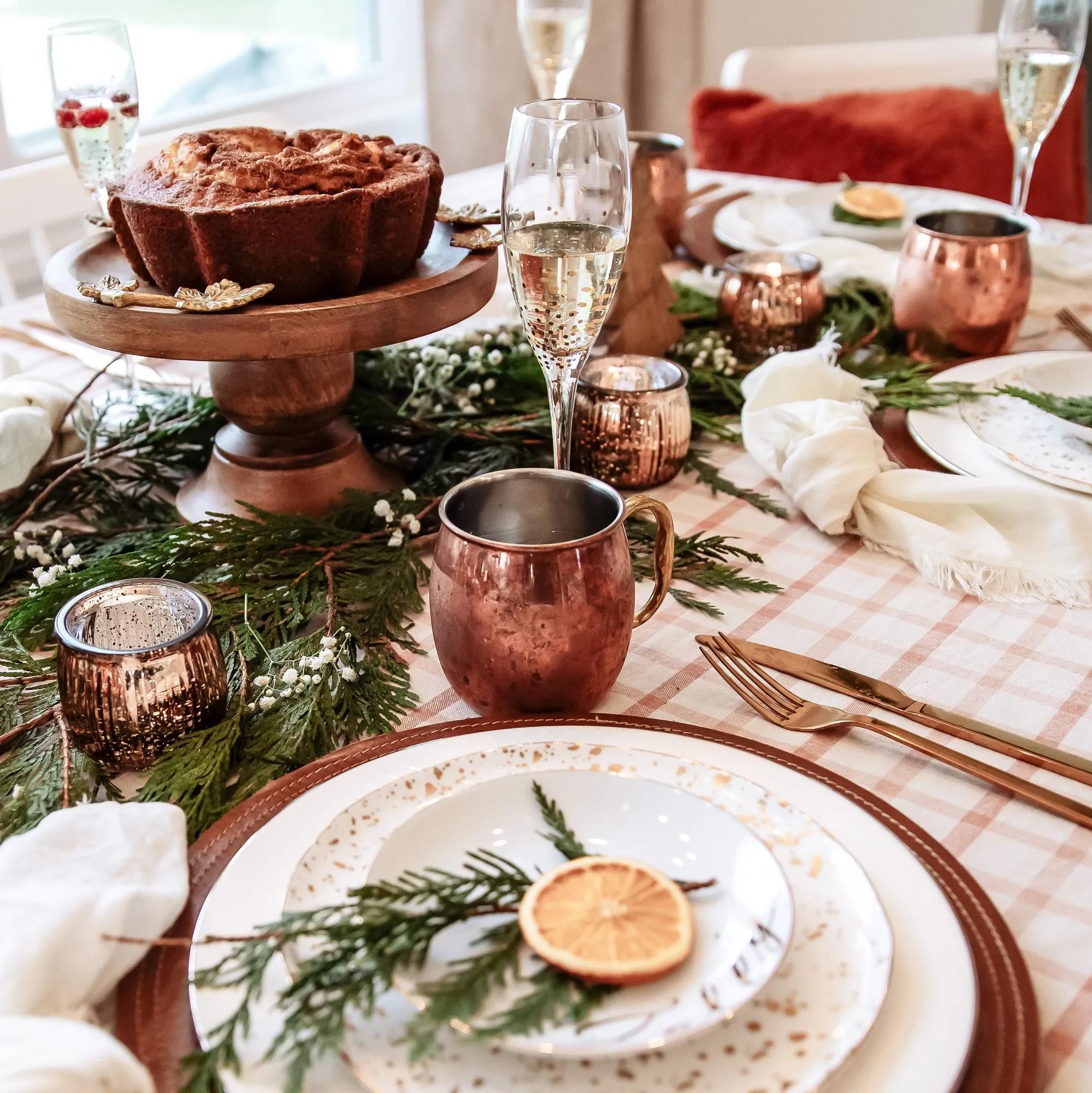 A gorgeous holiday themed table setting in a custom home