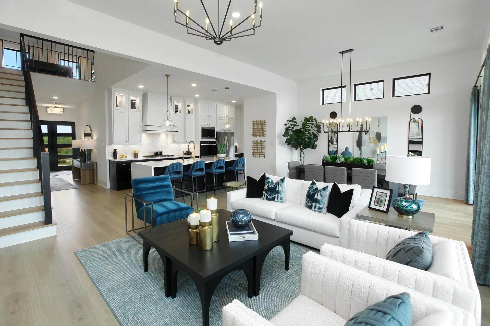 Custom home open floor plan family room, dining, and kitchen
