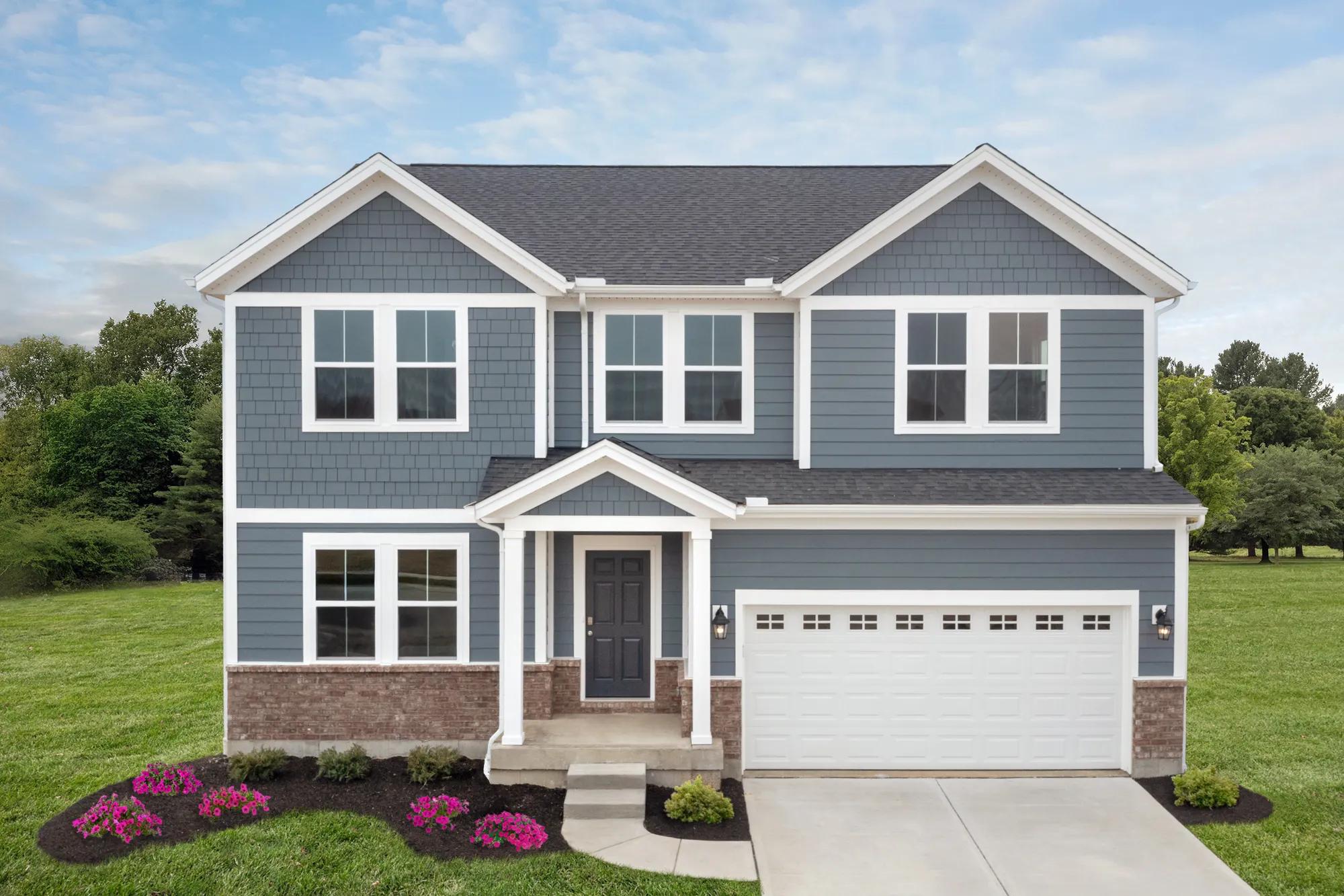 Two story, new construction home with covered porch and 2-car garage
