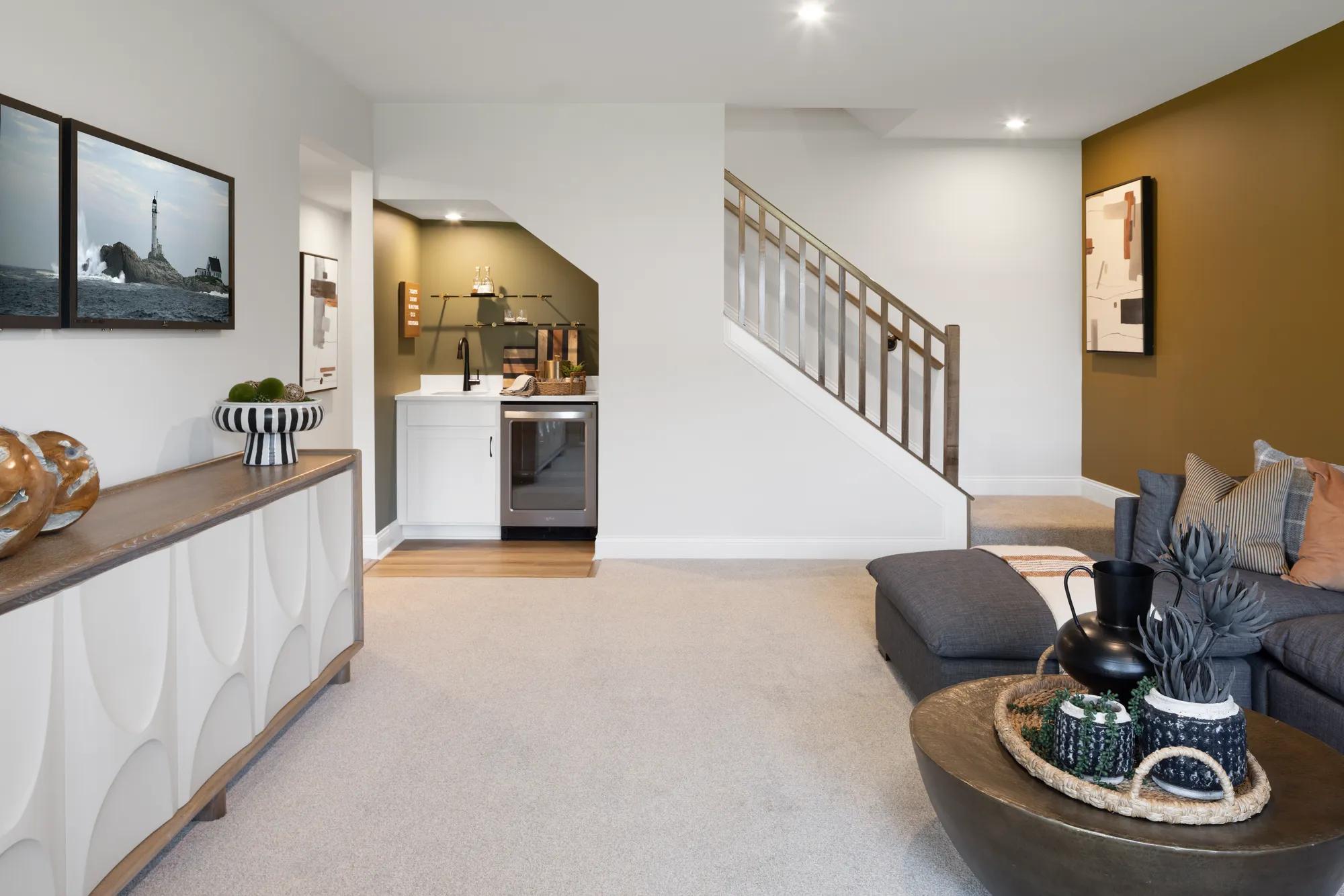 New townhome lower level recreation room with wet bar