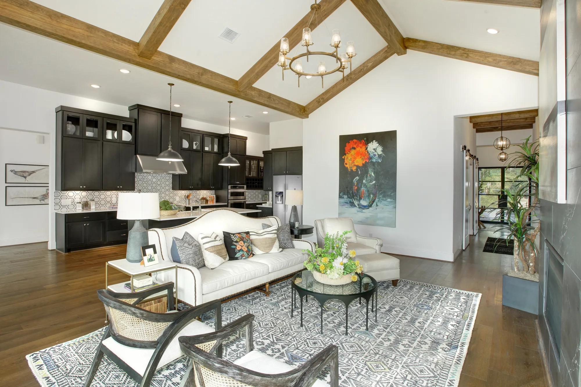 family room with vaulted beam ceiling