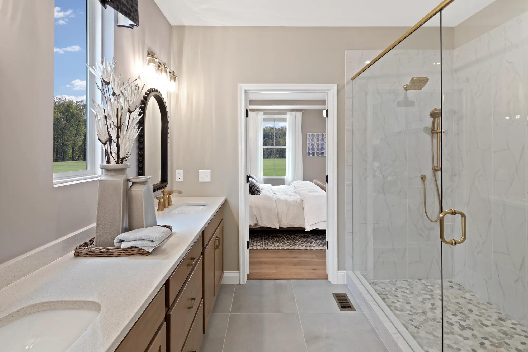 Primary Bath with double vanities and glass shower