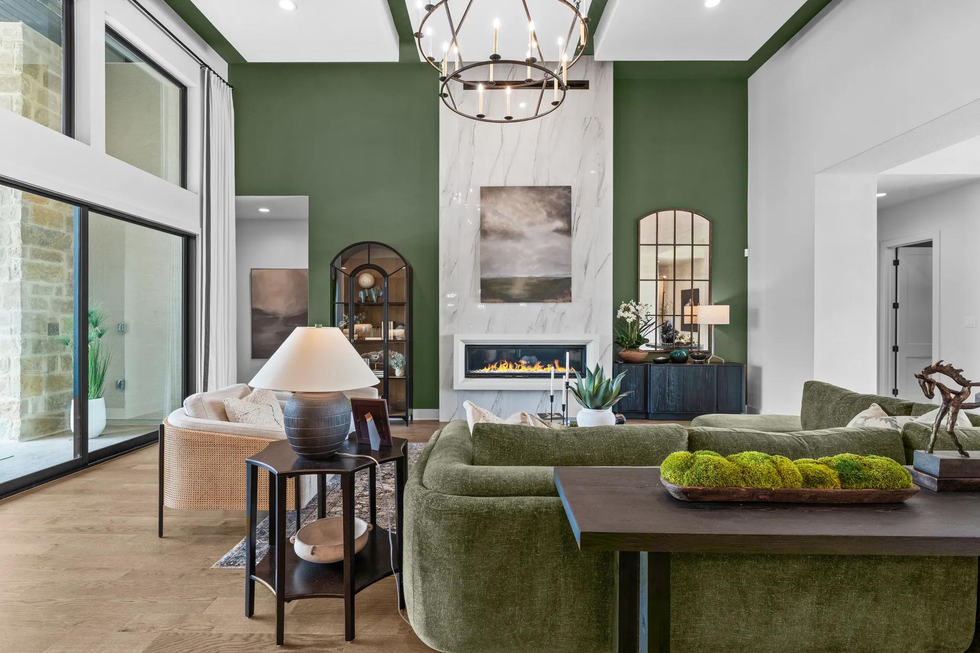 custom home living room with accent wall and contemporary fireplace