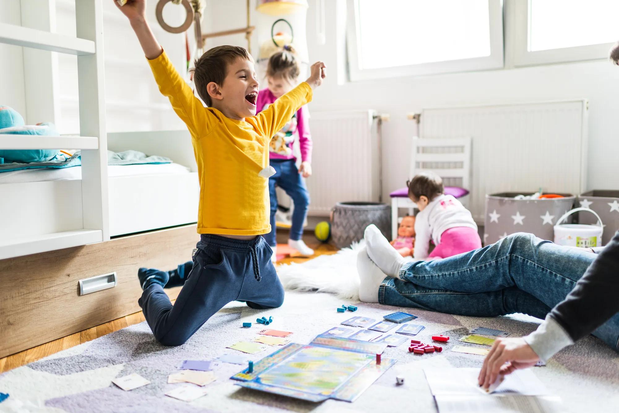 Family playing in new home gameroom