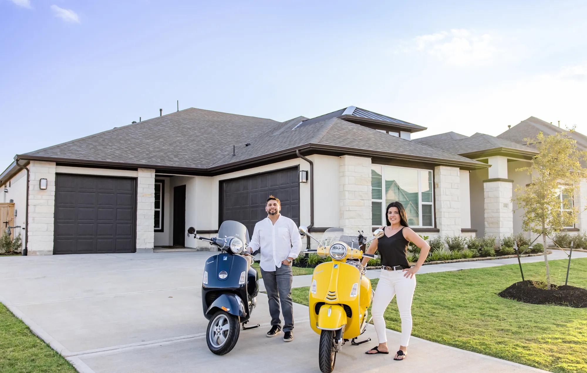 New homeowners enjoying the space in front of their beautiful Lauren style home