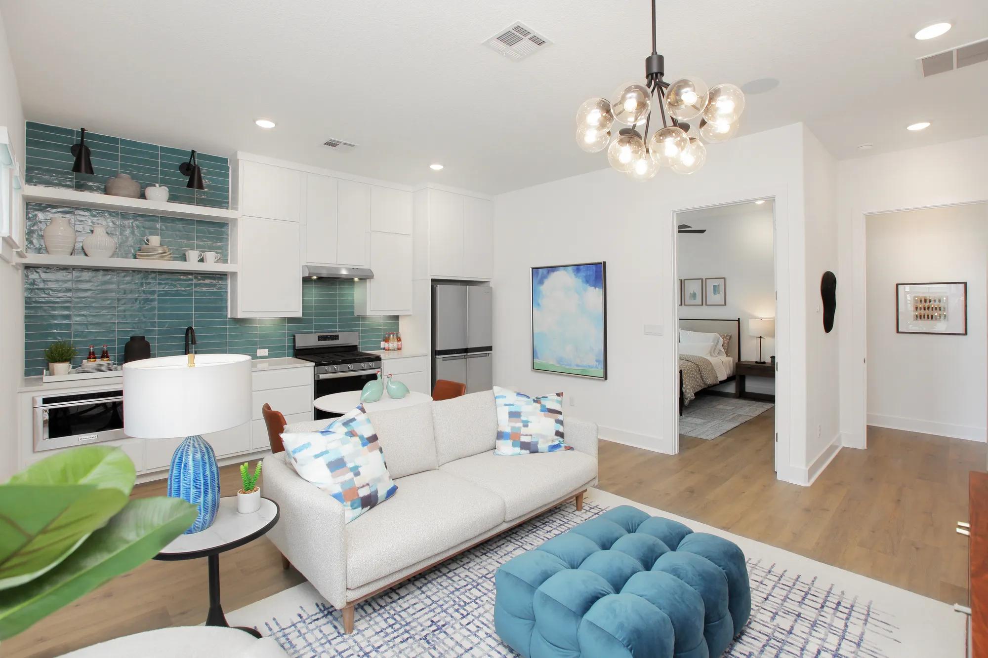 New home guest suite with living room, kitchen, and bedroom