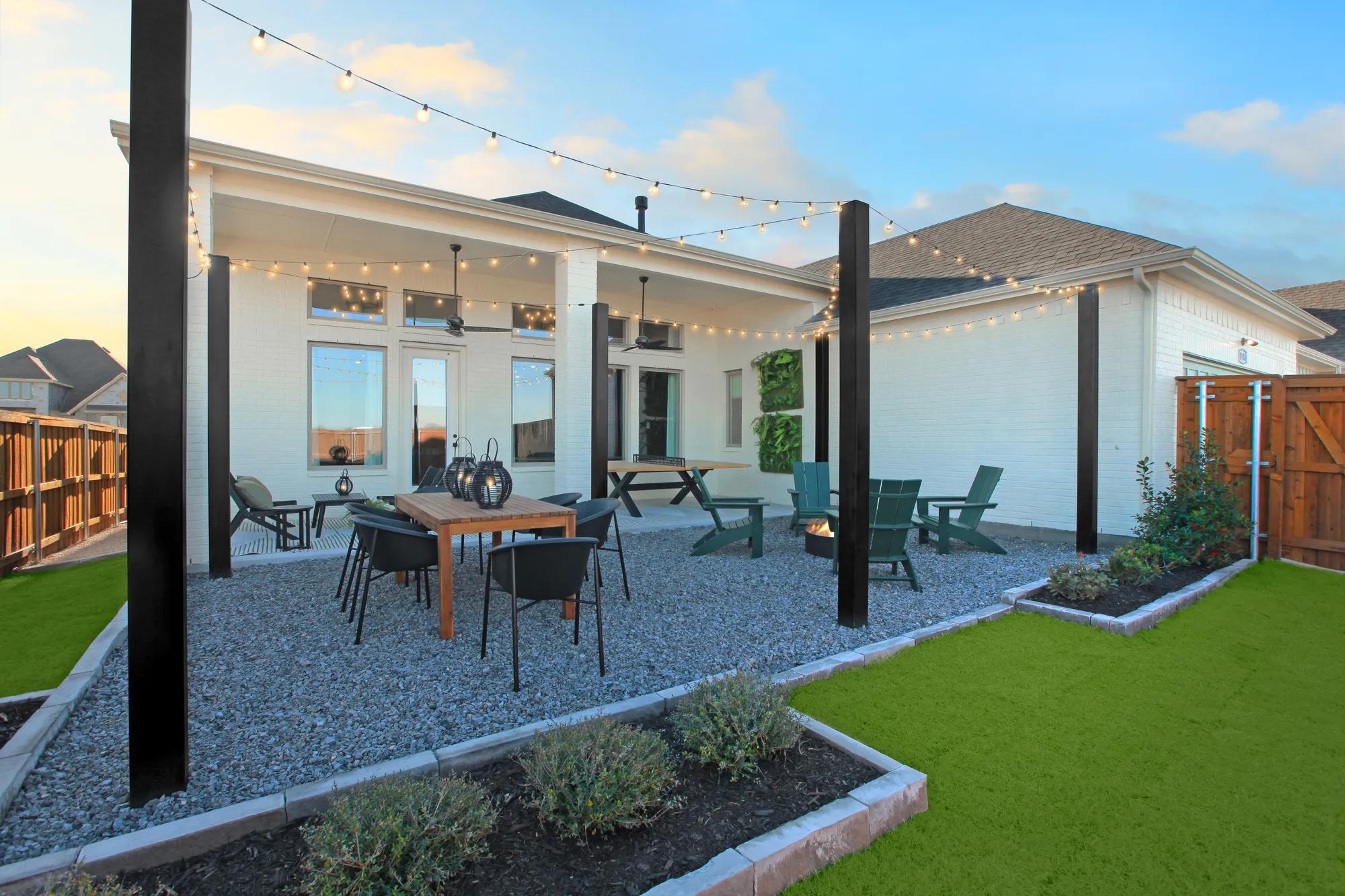 new home patio with dining table and firepit