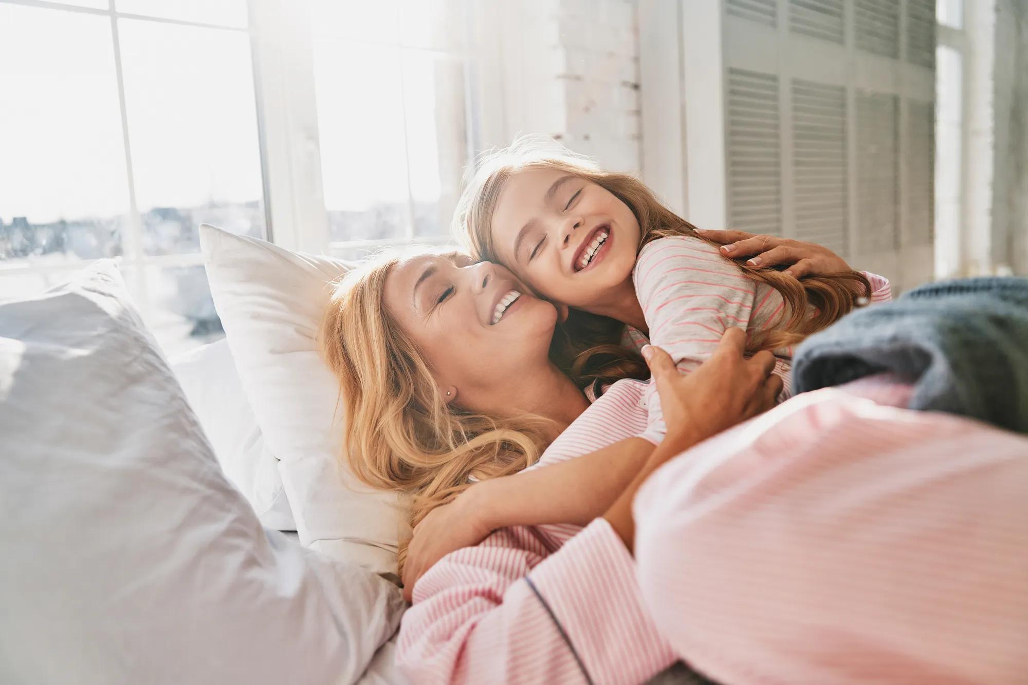 Mother and daughter in home