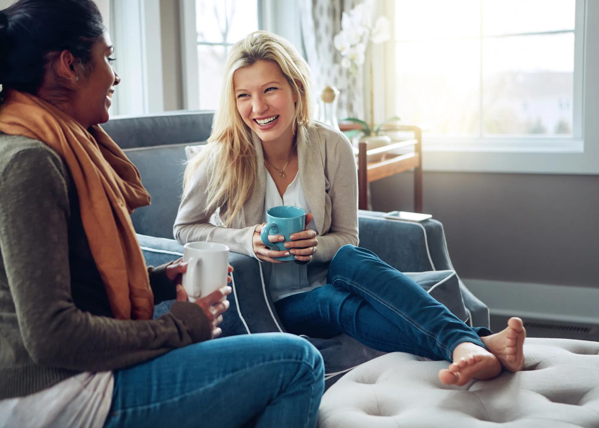 Friends drinking coffee at home