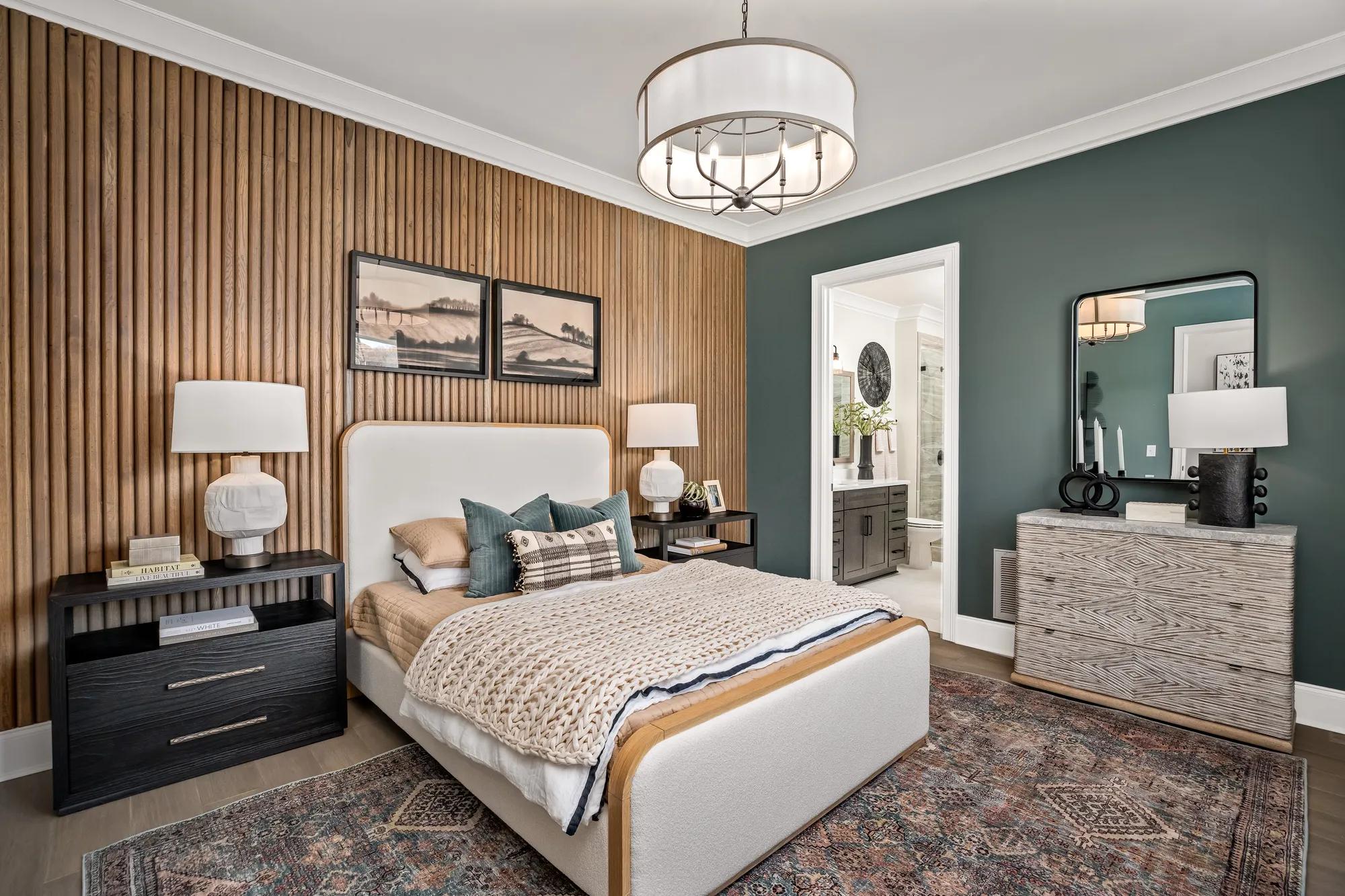 guest suite with wood accent wall