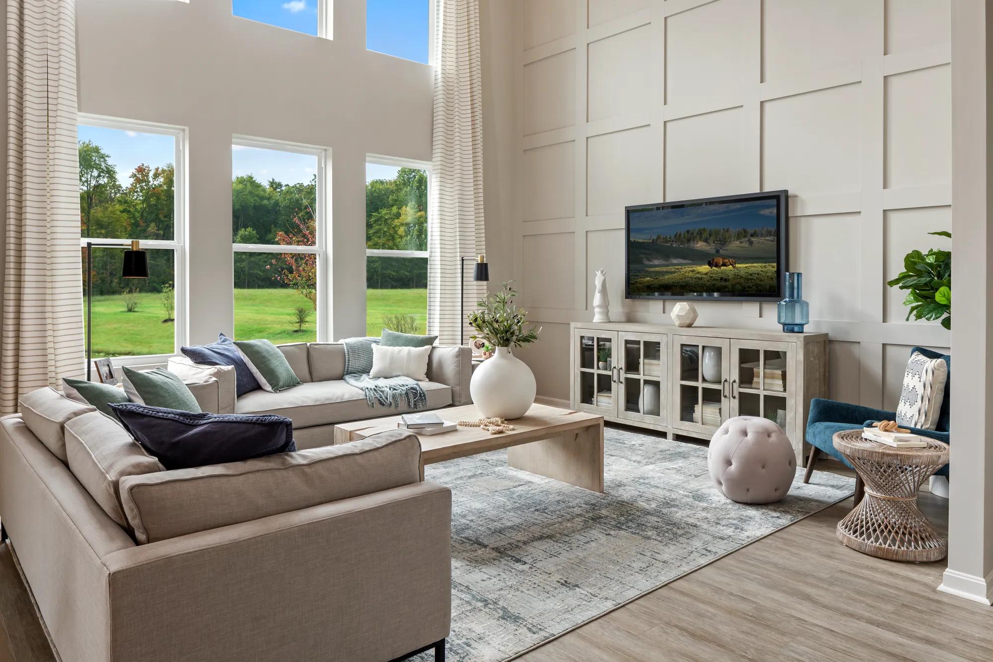 two-story family room with wall of windows