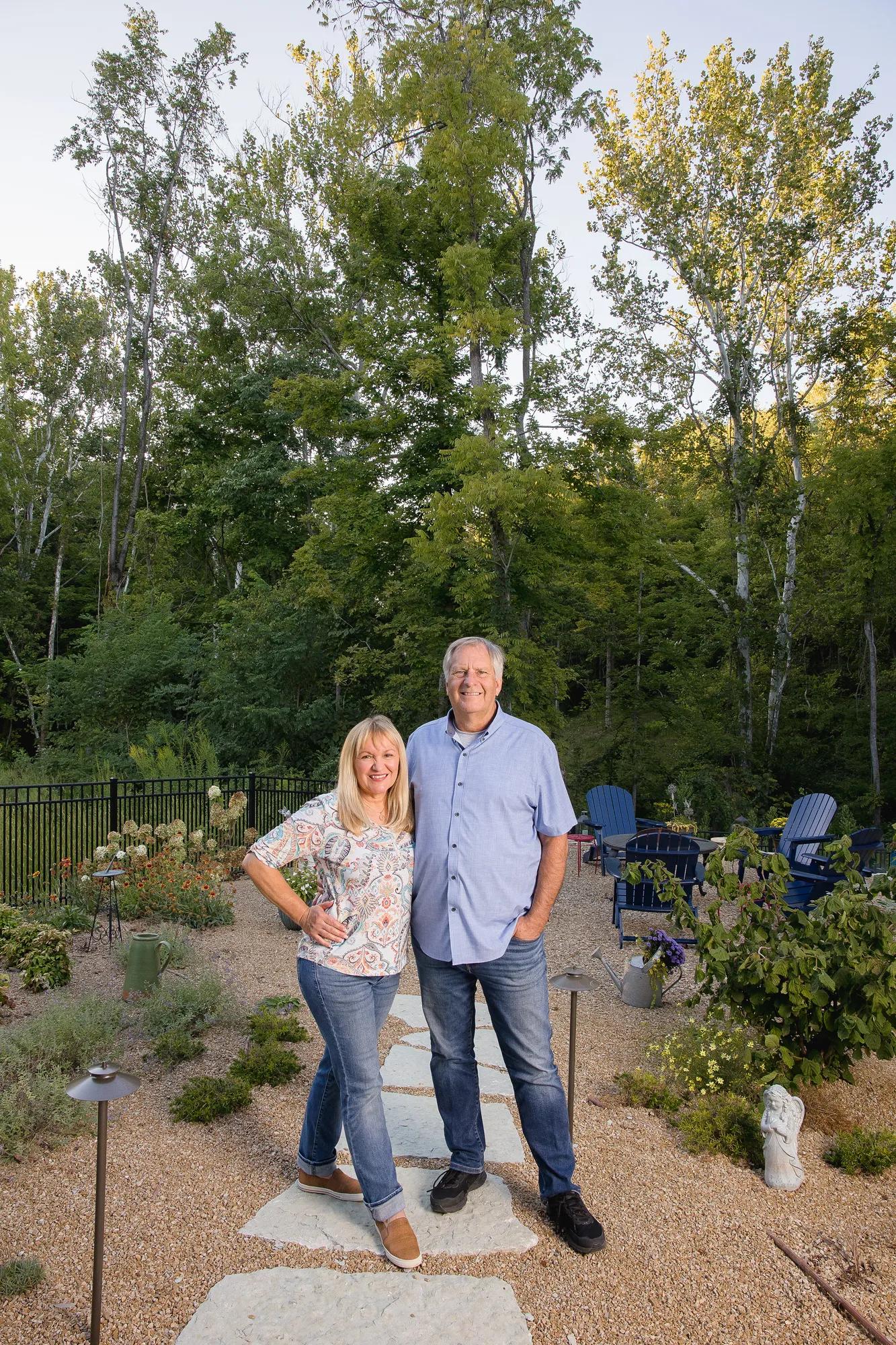 New homeowners outside of their Drees home