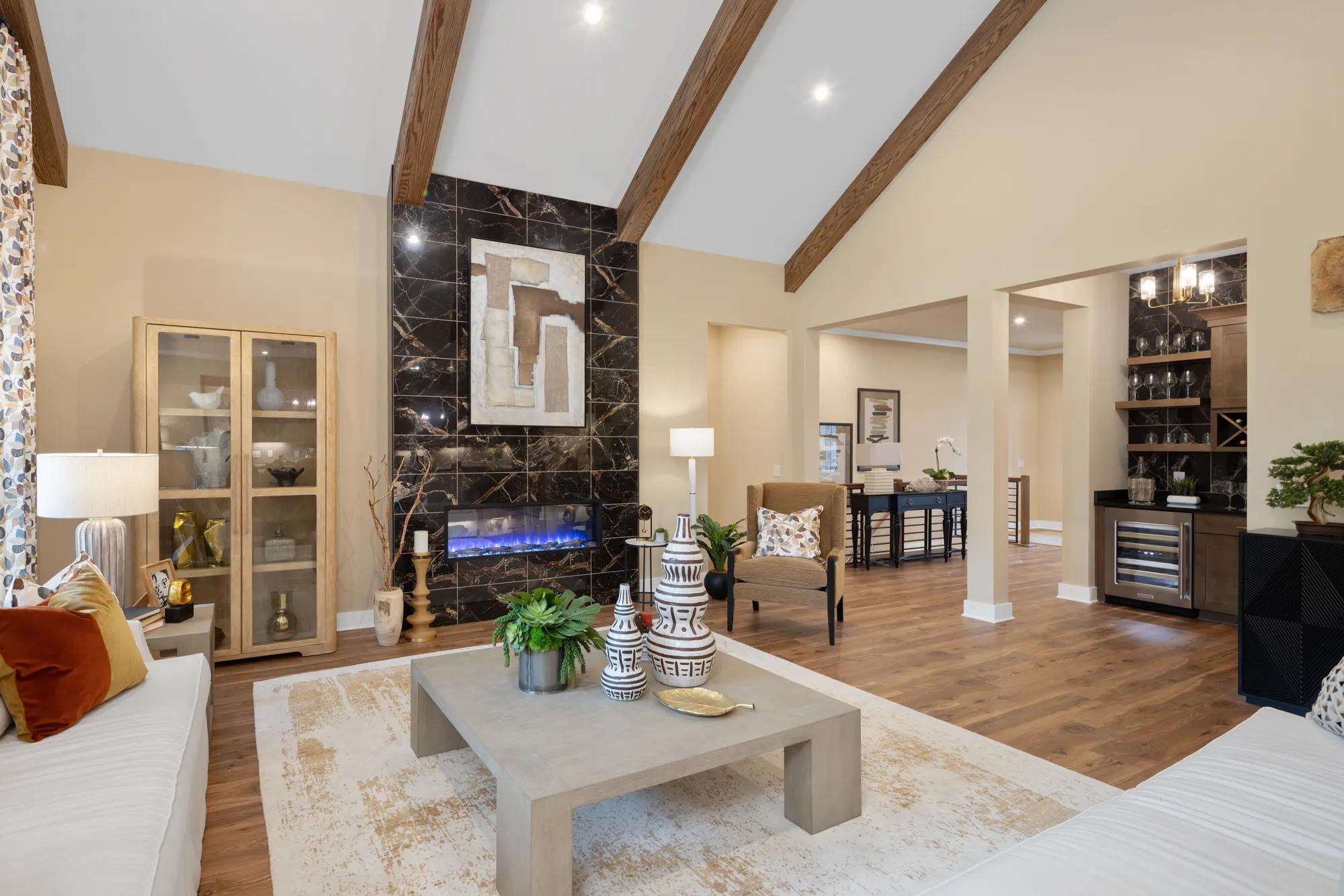 New home family room with black tile fireplace