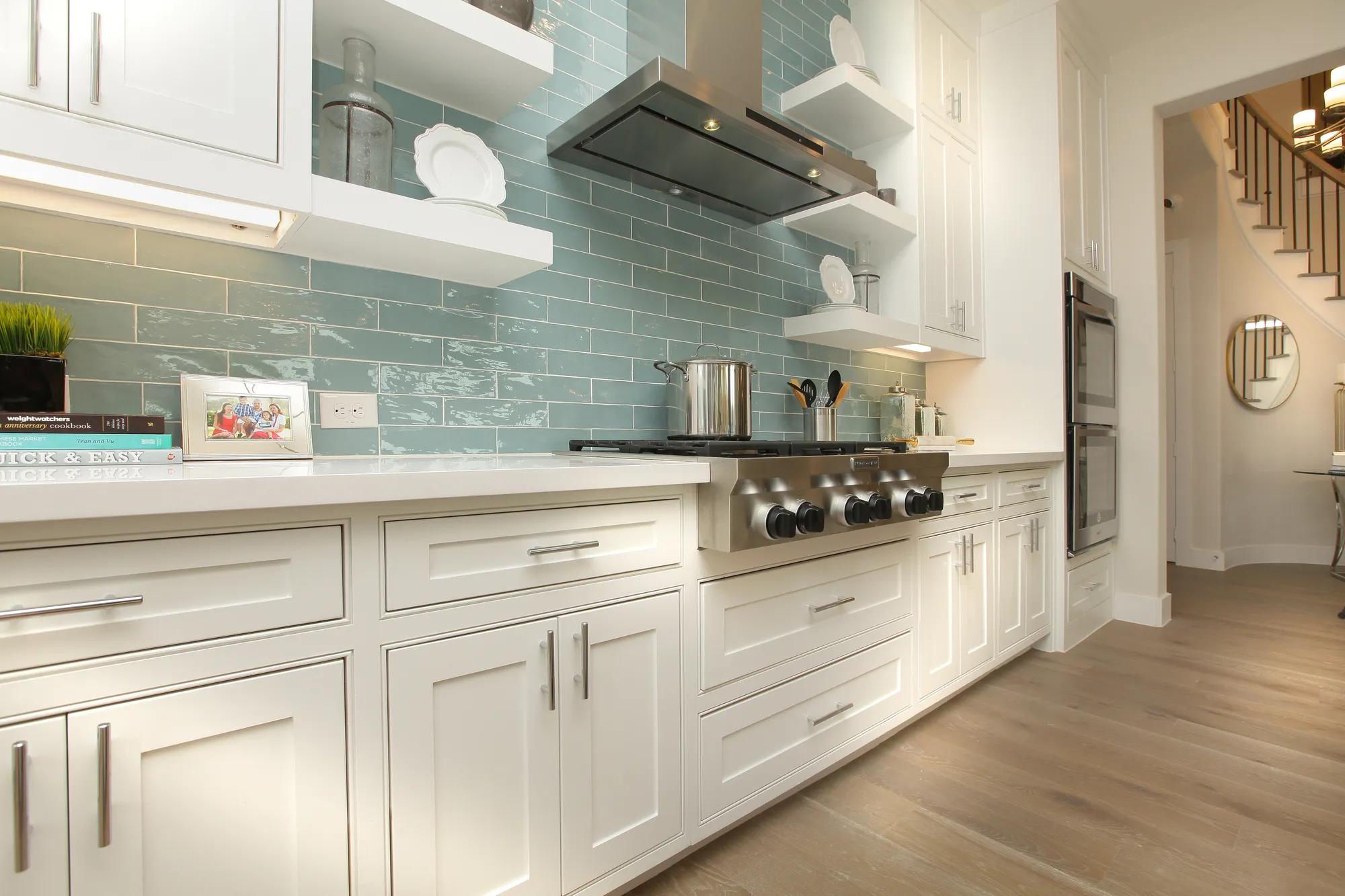kitchen with white cabinets and gas cooktop