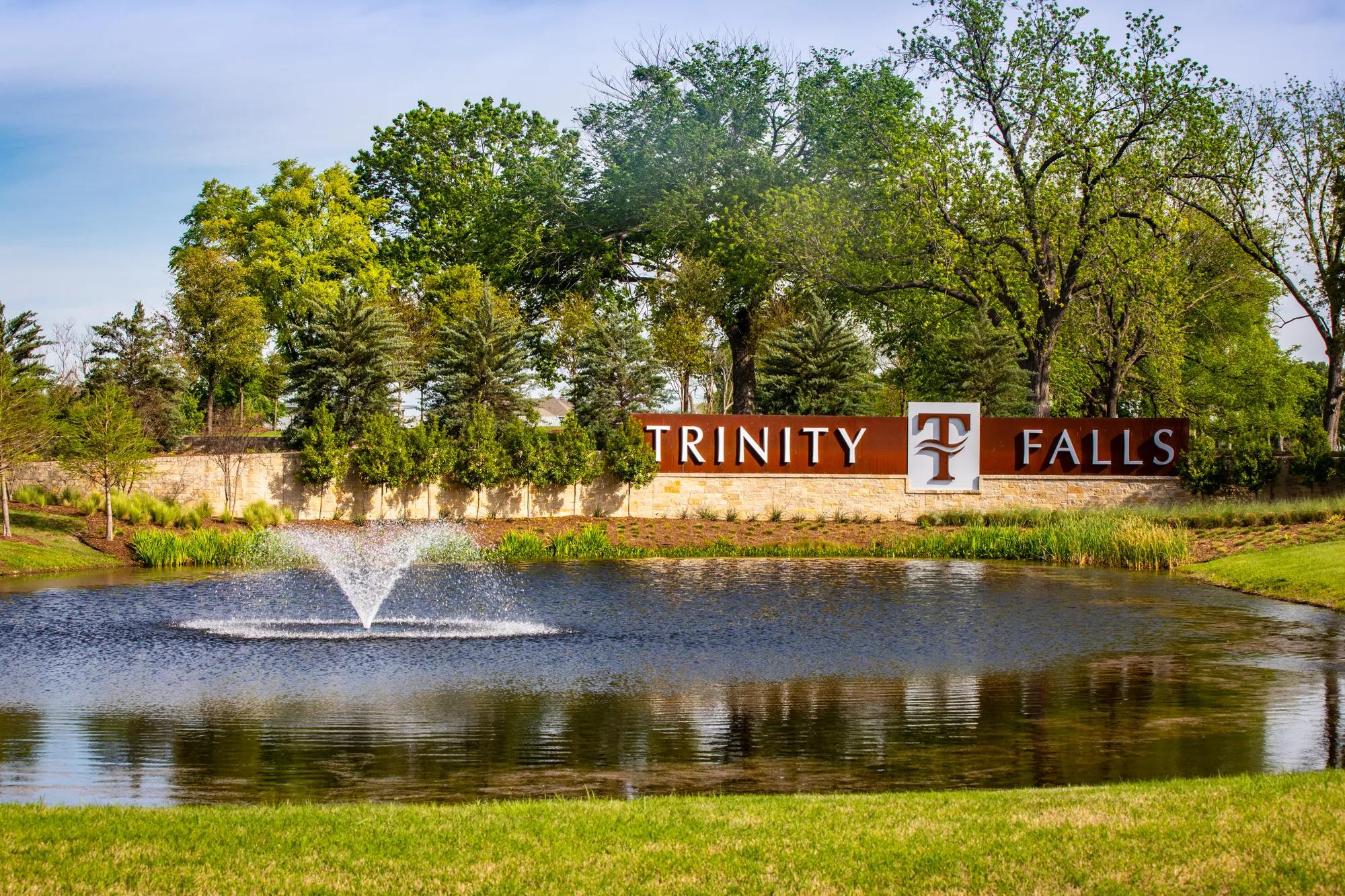 Community entrance with pond and fountain