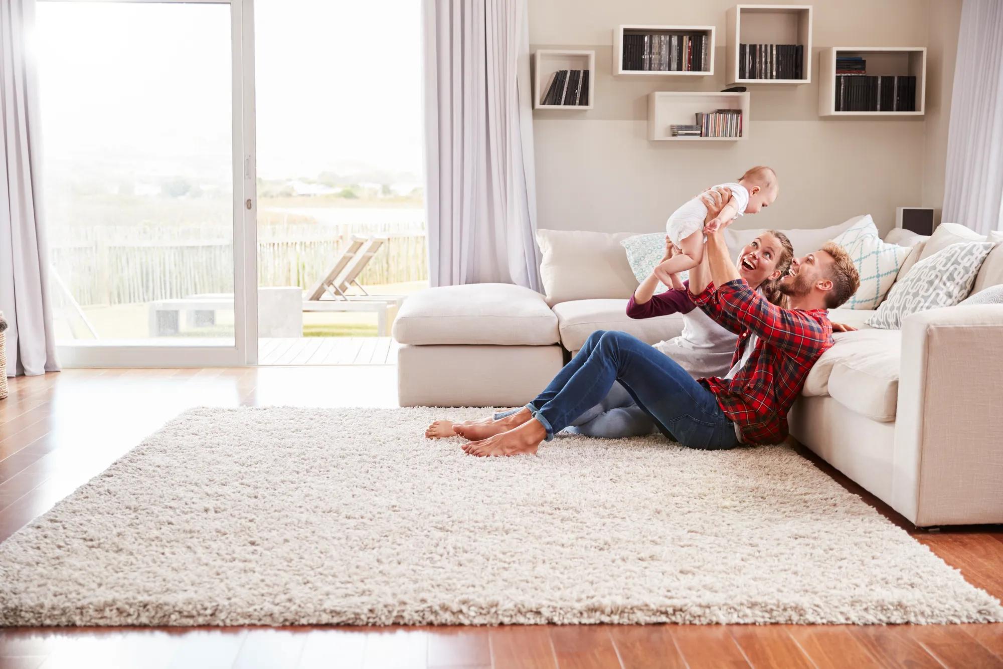 Family enjoying new home living room