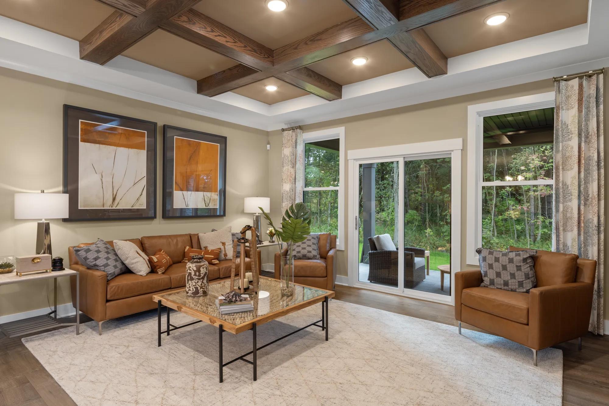 family room with coffered ceiling
