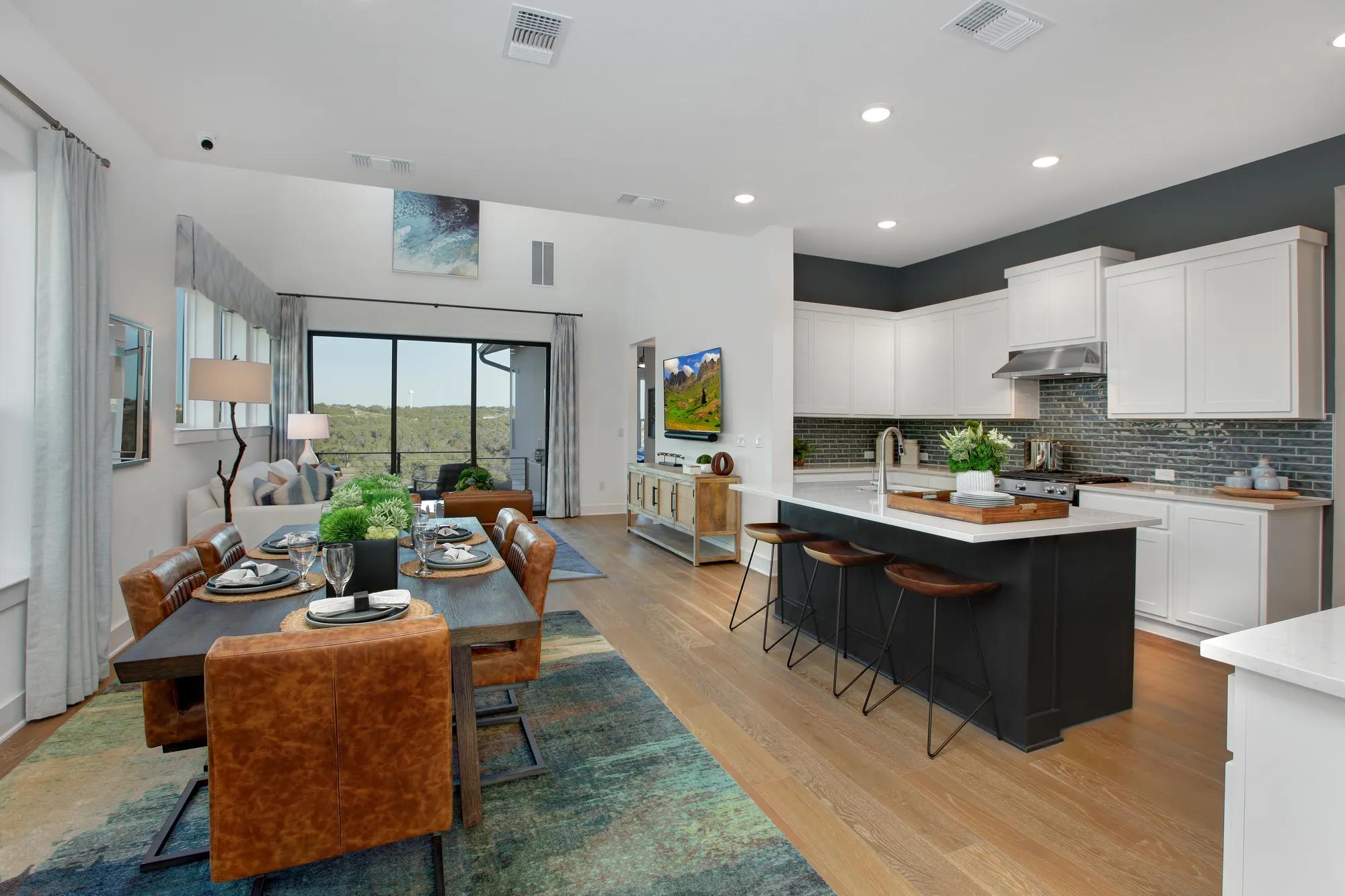 Custom home open concept dining room, kitchen, and living room