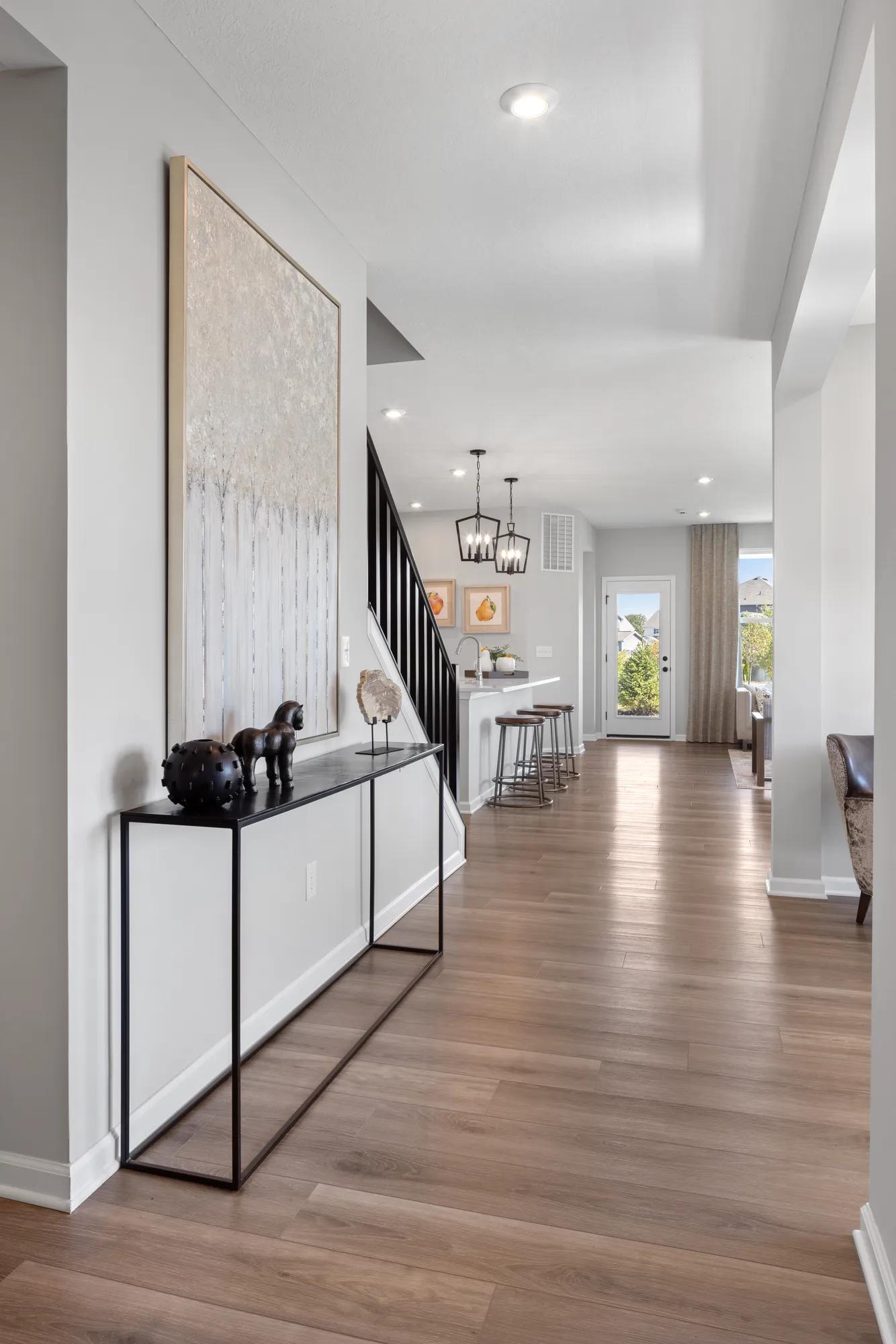 hallway with luxury vinyl tile flooring