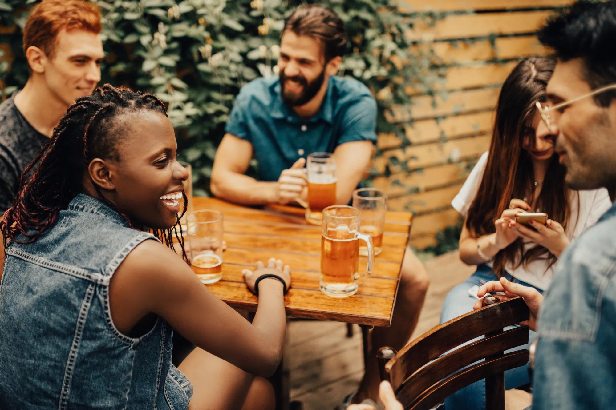 Group of friends socializing at a local brewery 