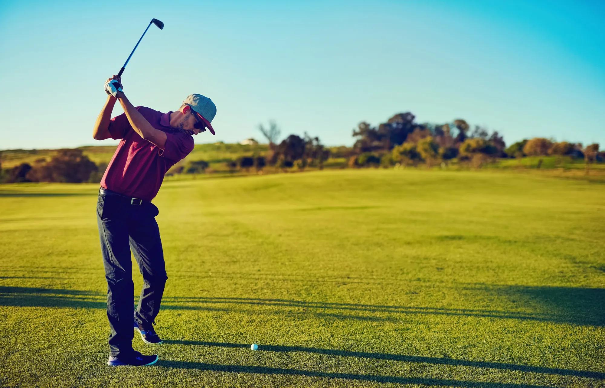 Young man playing golf