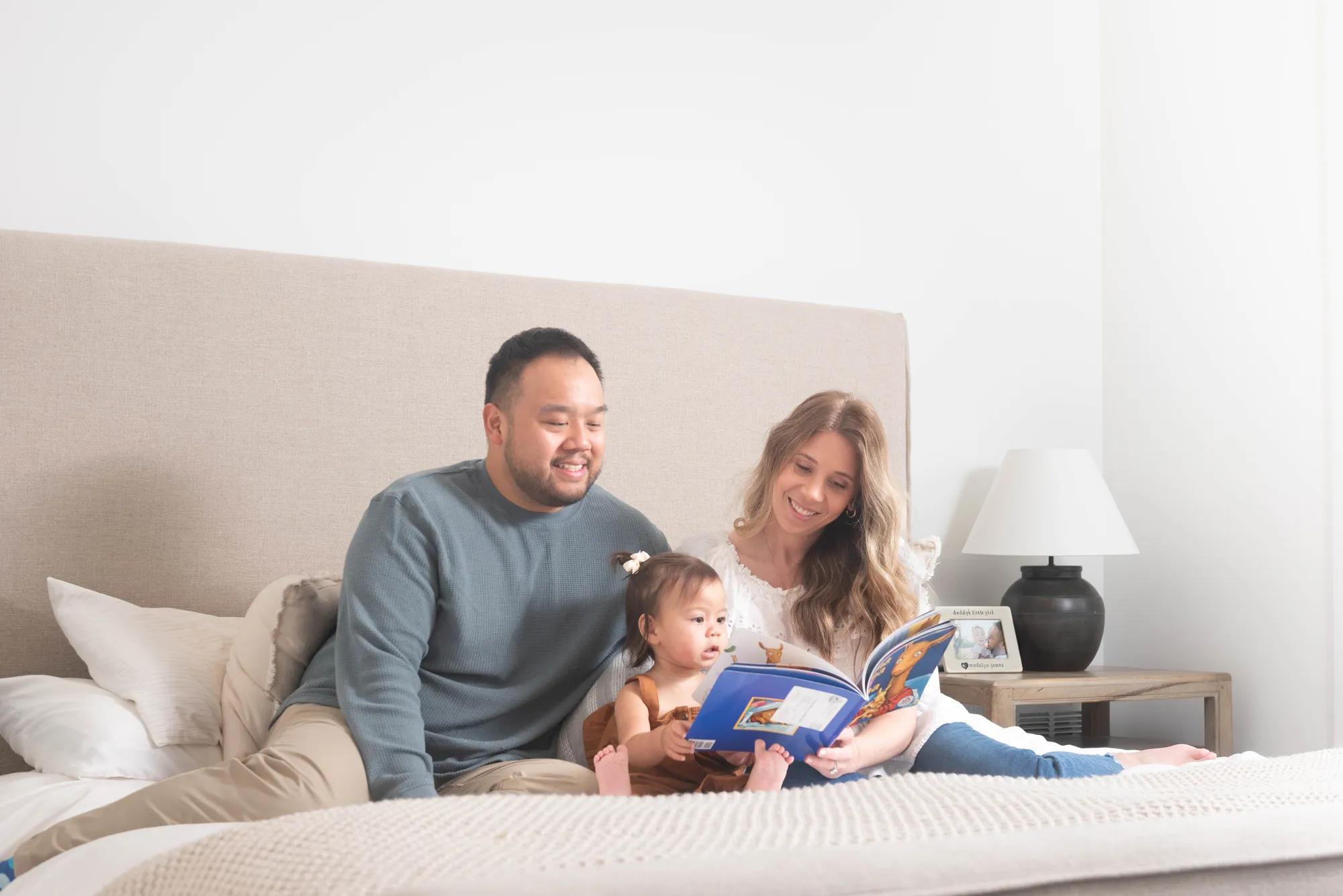 New homeowners relaxing in the luminous Wilshire owners suite