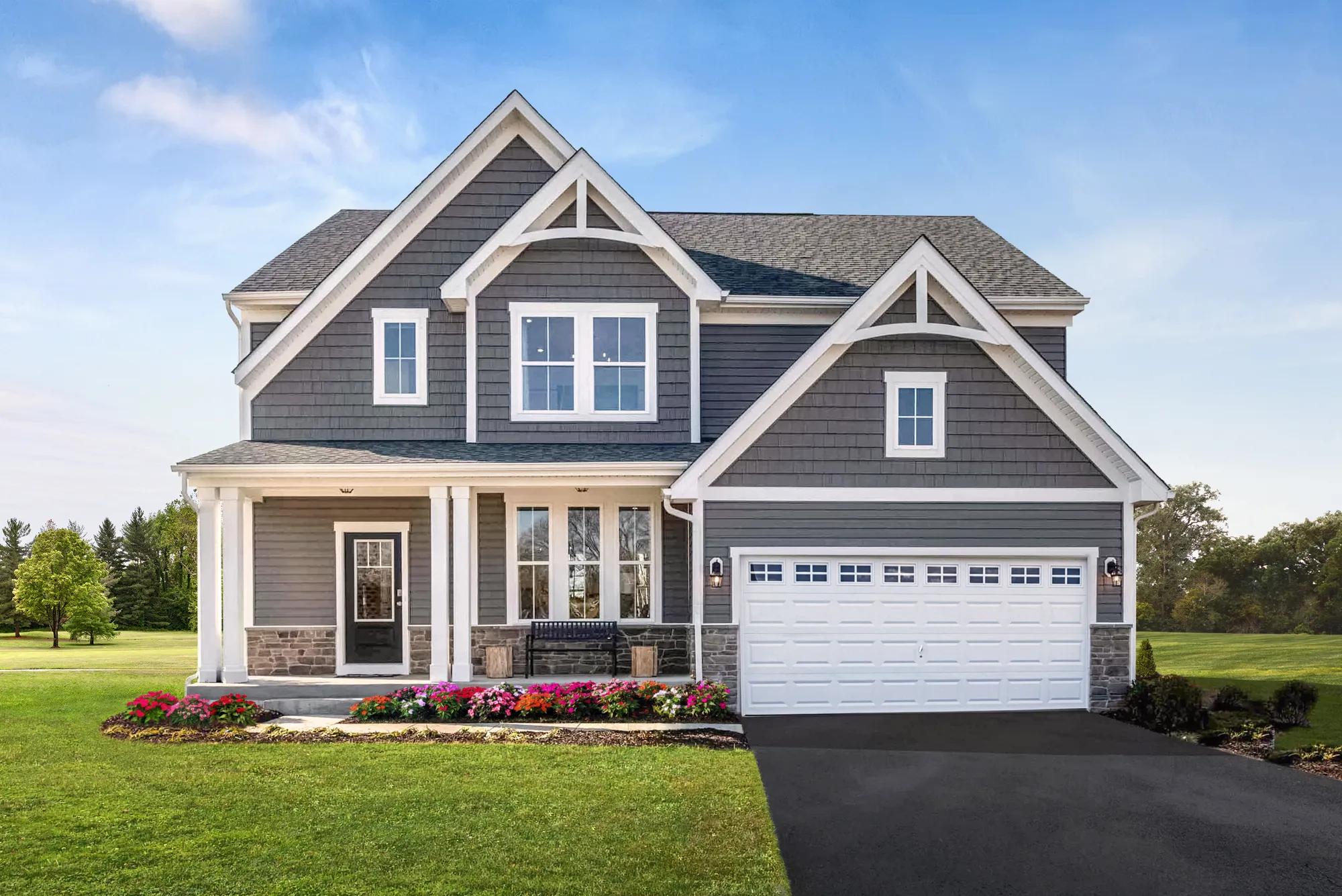 custom Drees home with shakes and siding exterior