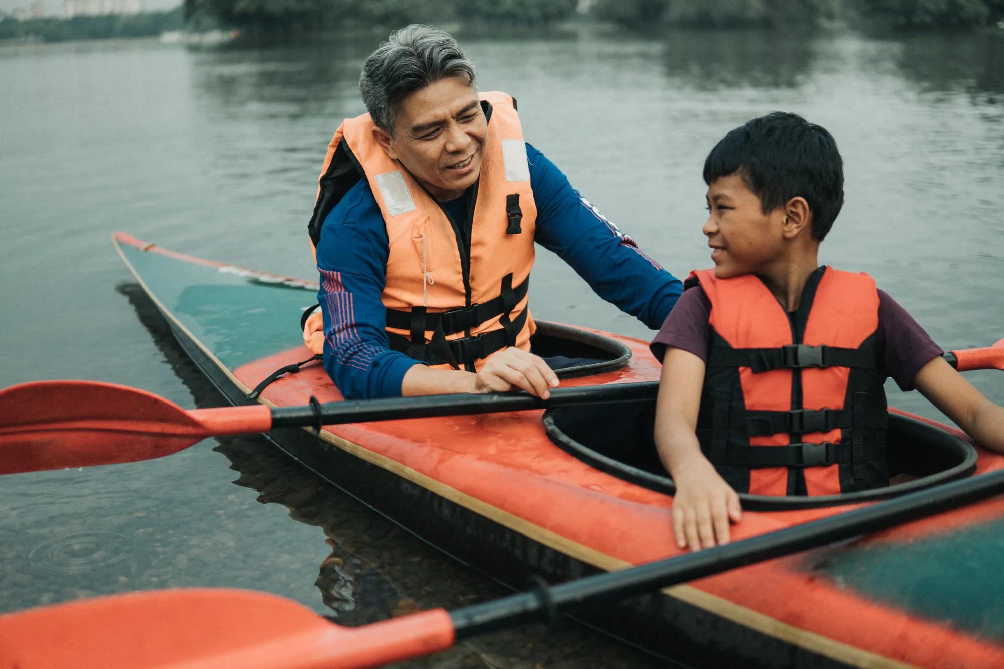 father and son kayaking