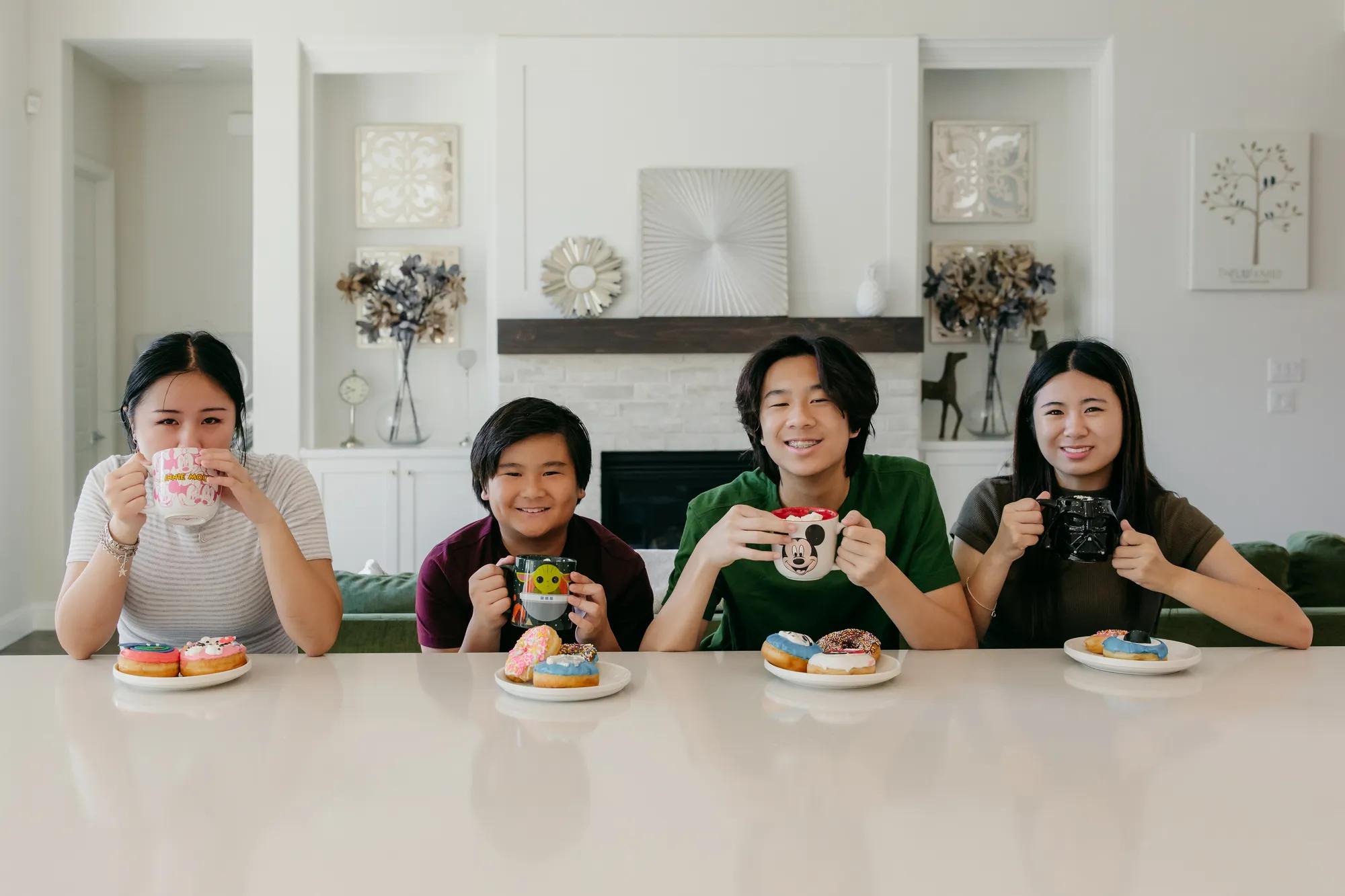 New homeowner family enjoying their beautiful kitchen with many modern touches