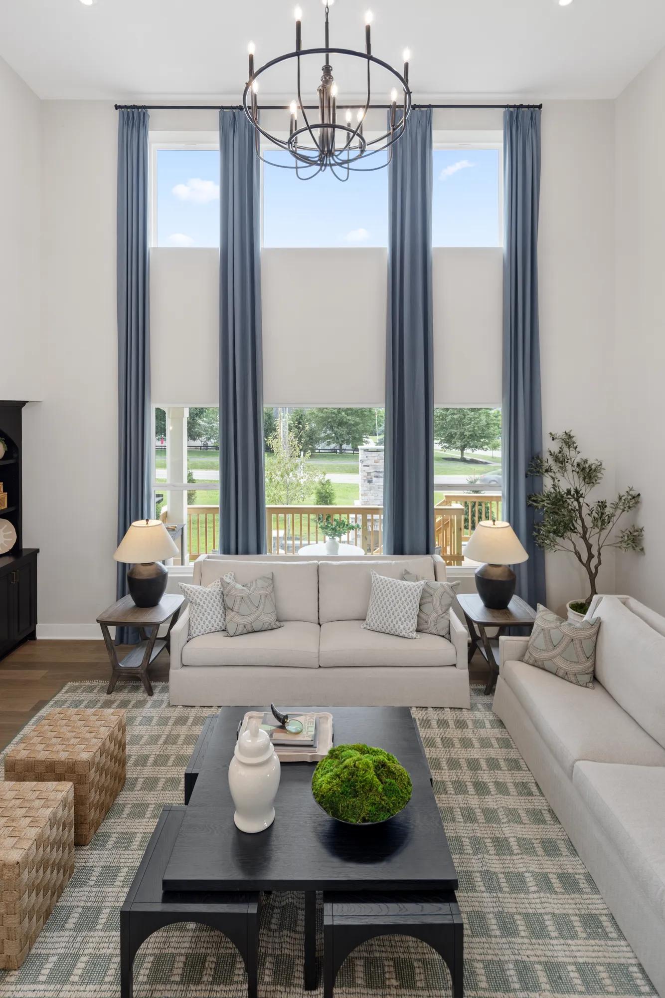 new home family room with wall of windows