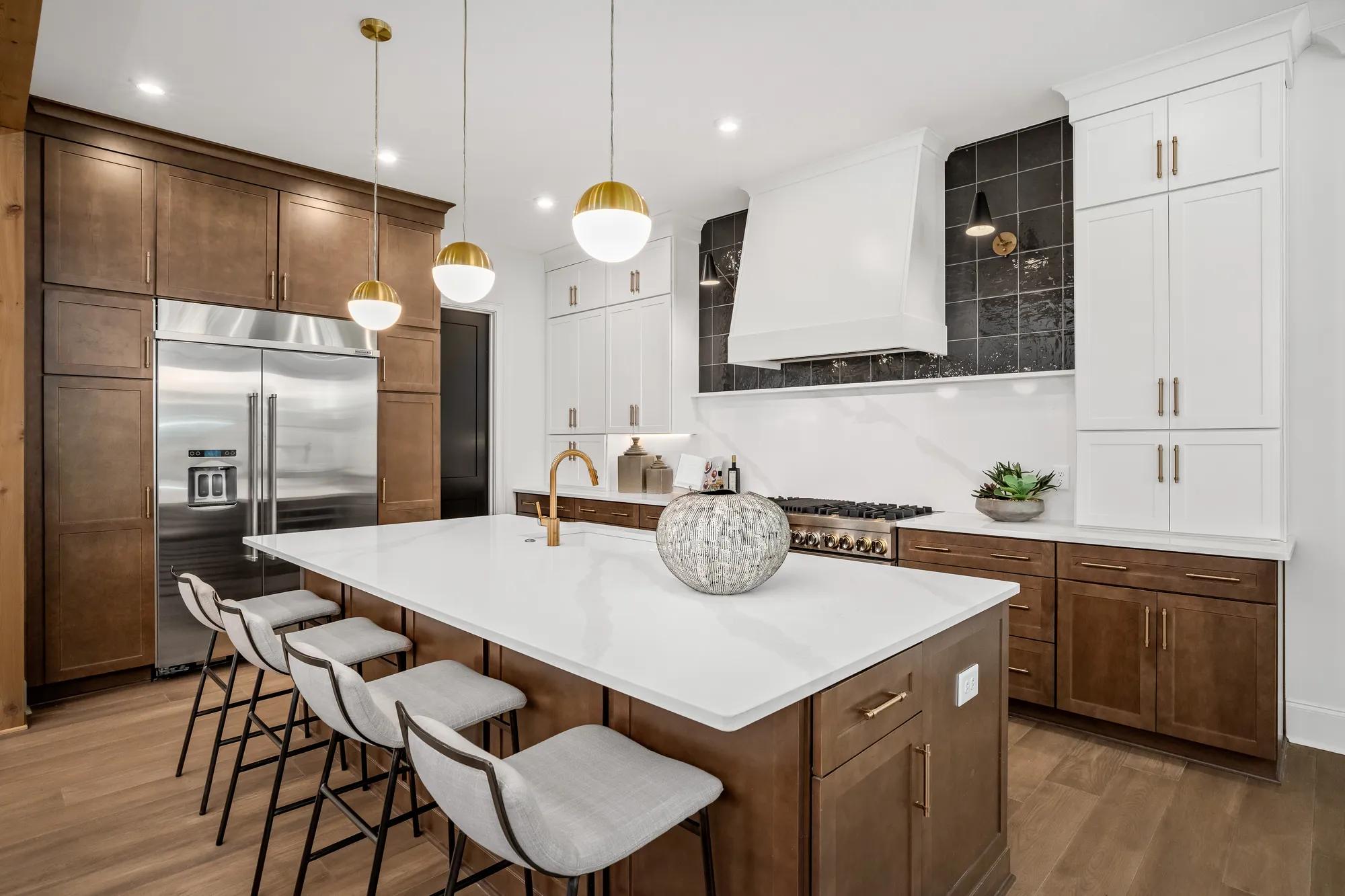 new home kitchen with stainless steel appliances