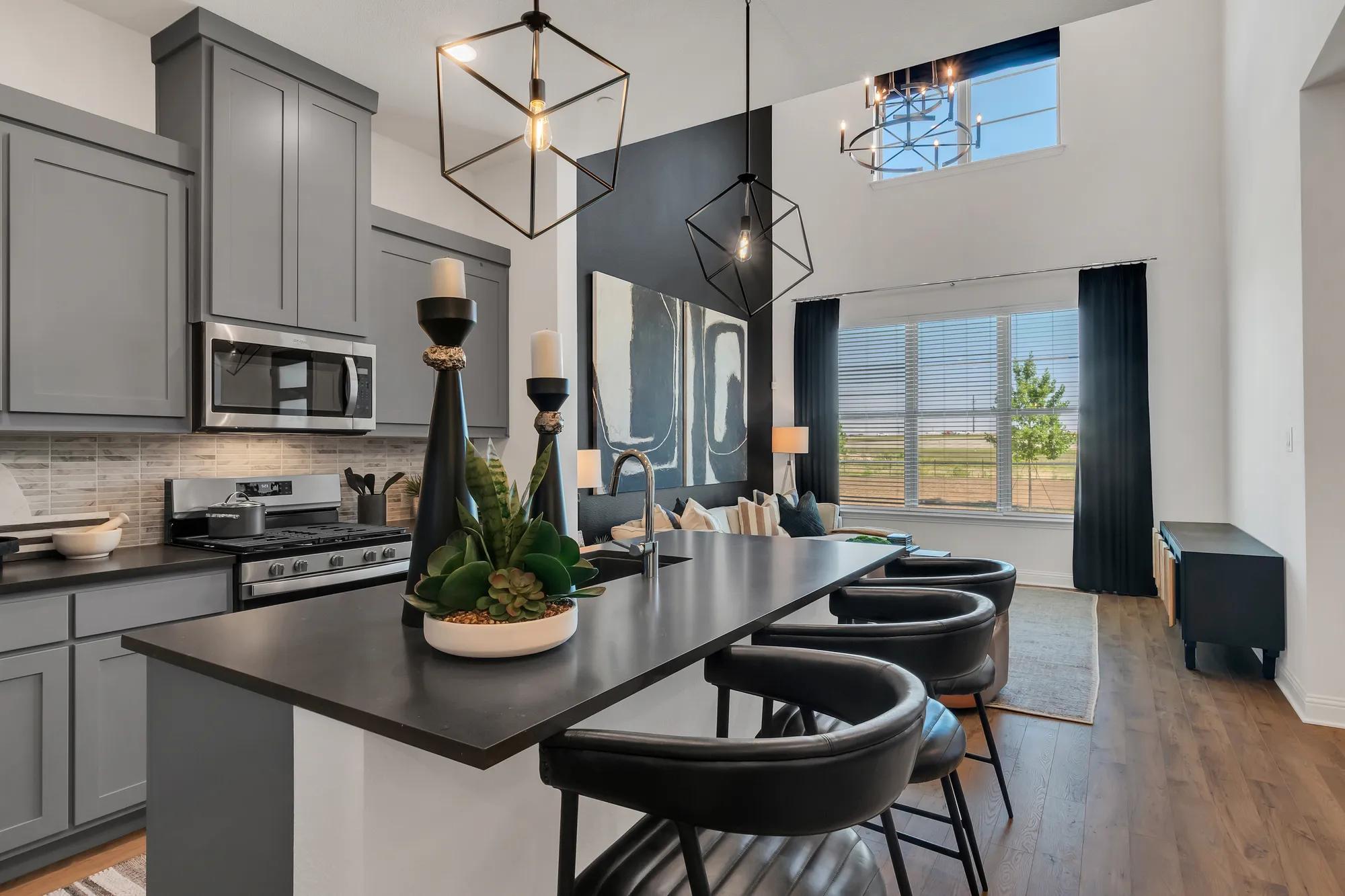 New townhome kitchen and family room with hardwood floor