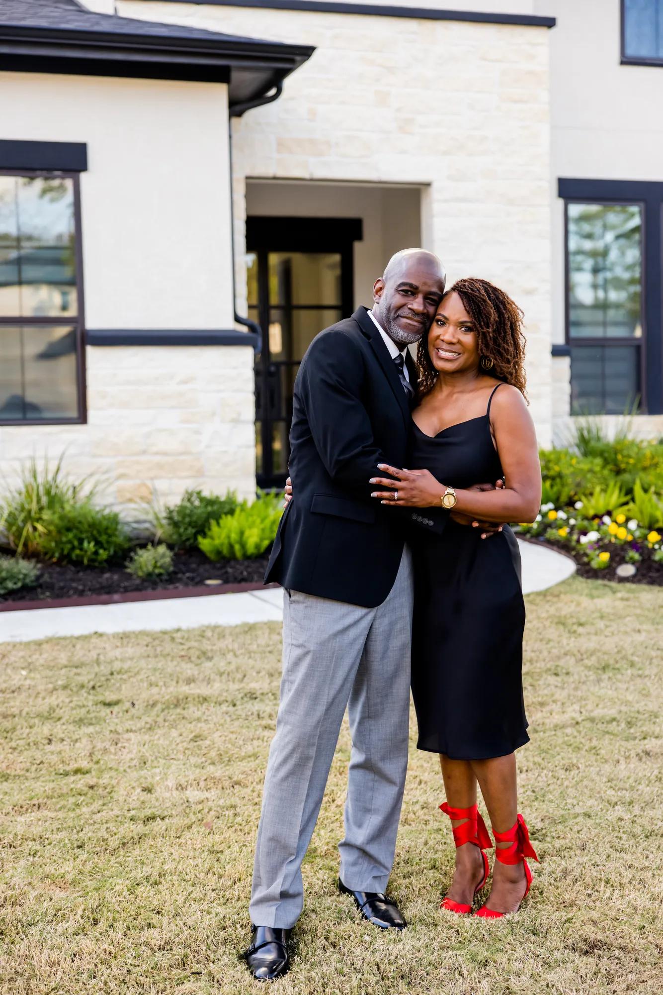 New homeowners enjoying their beautiful brick Drees Home