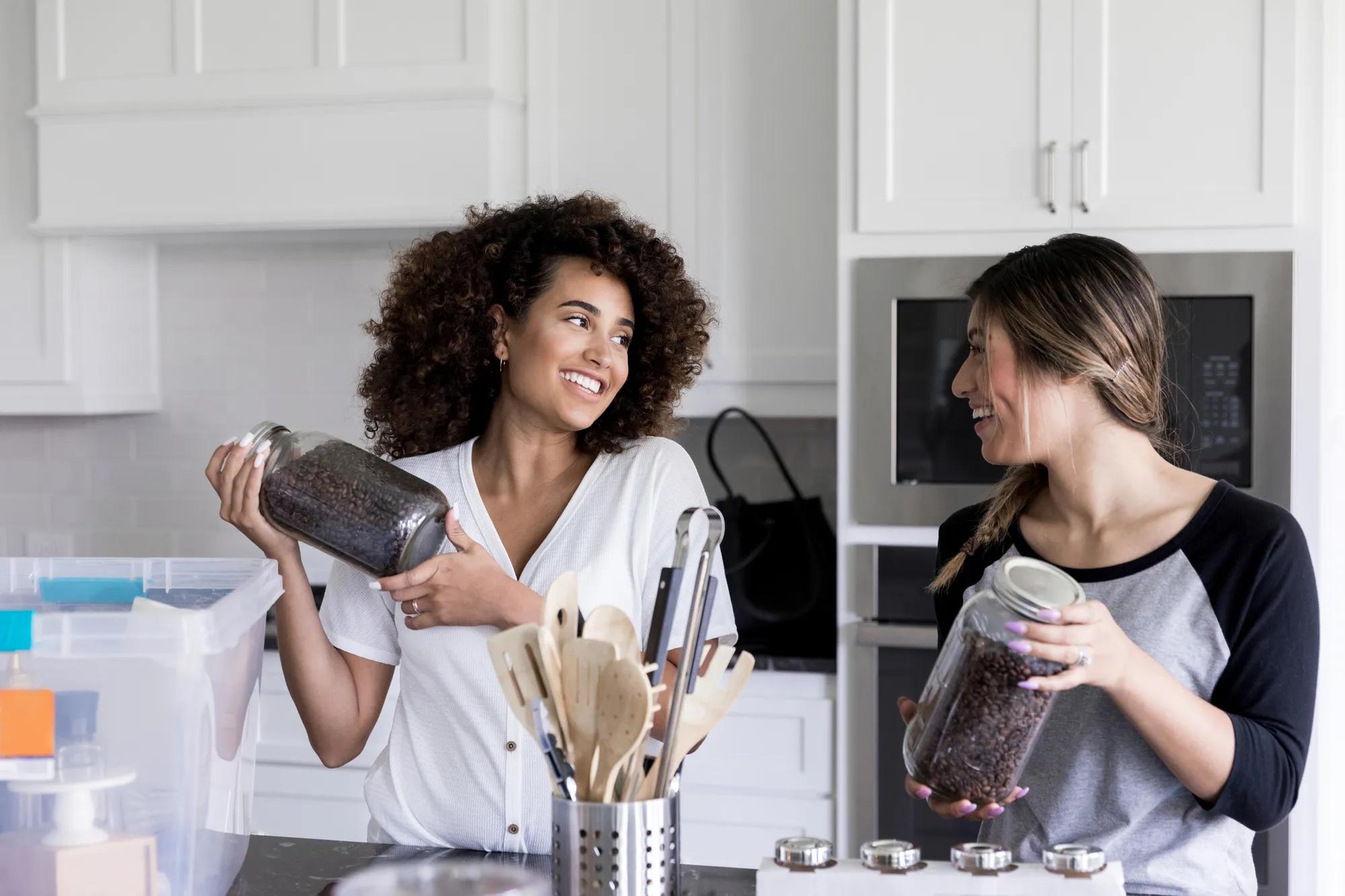 Friends in home kitchen