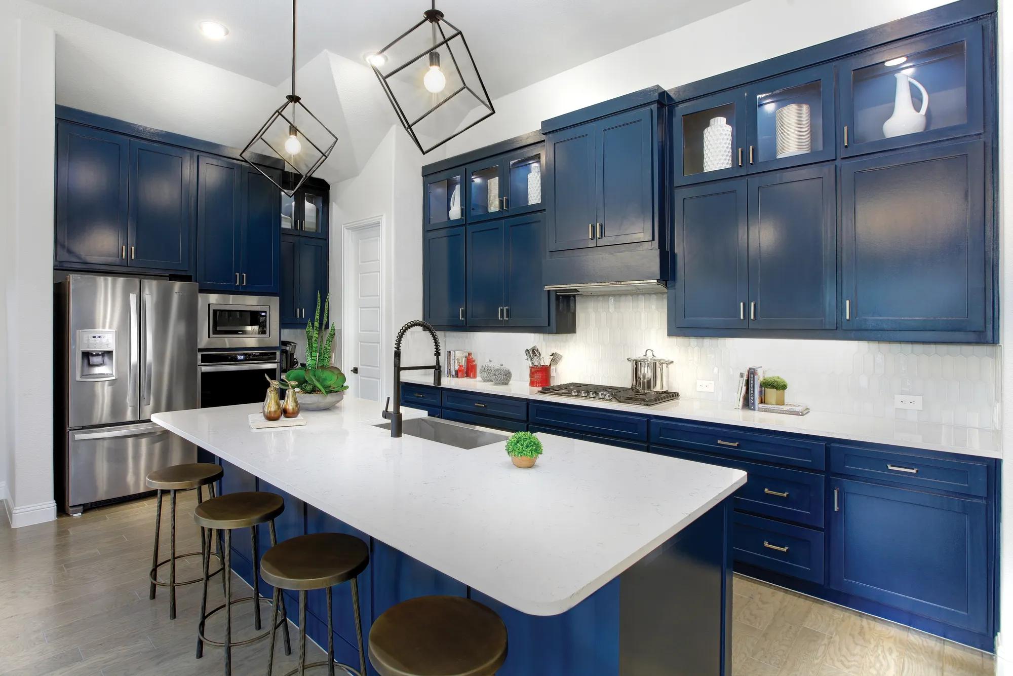 kitchen with large island and blue cabinets