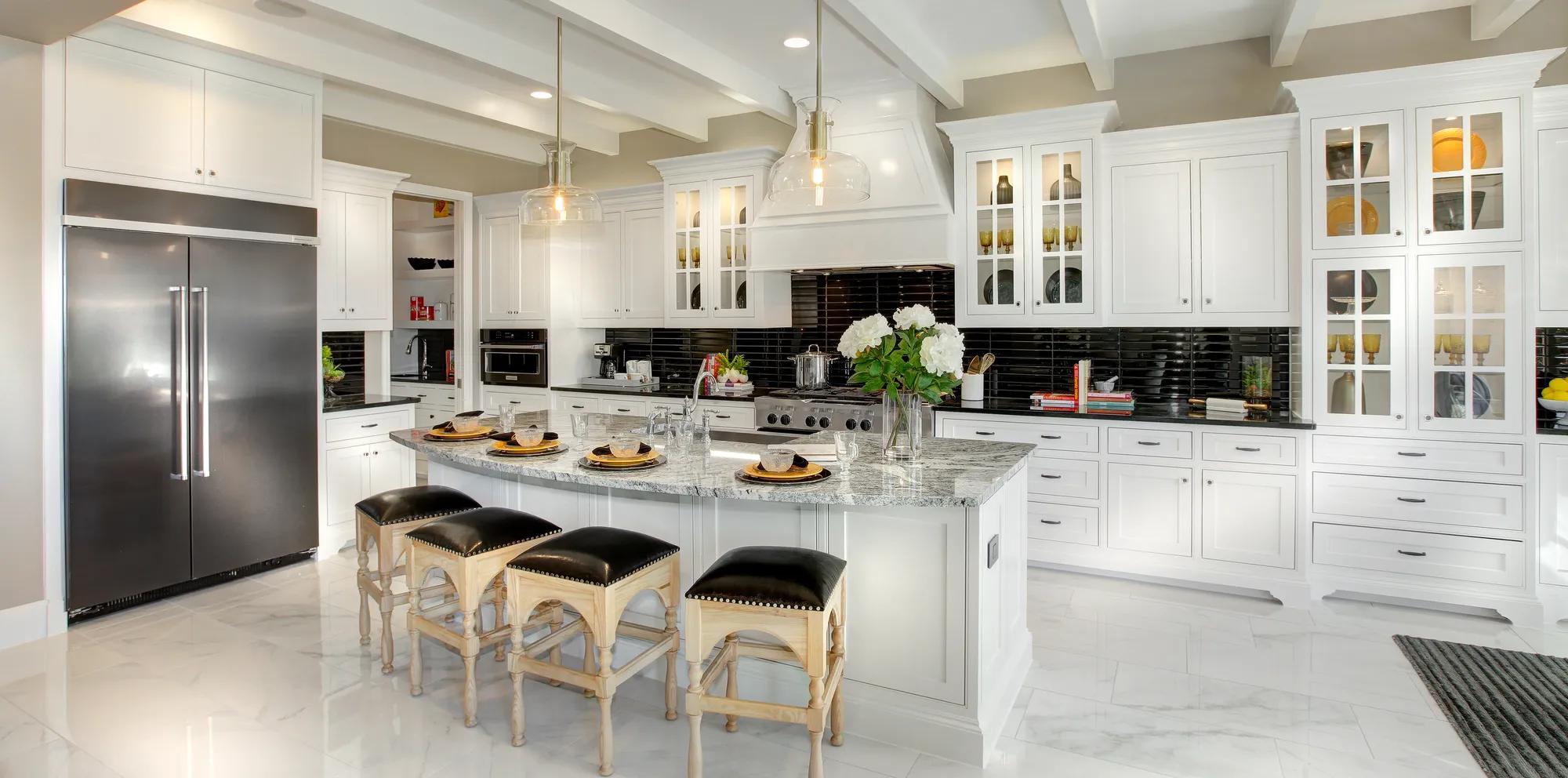 Kitchen with white cabinets and stainless steel appliances