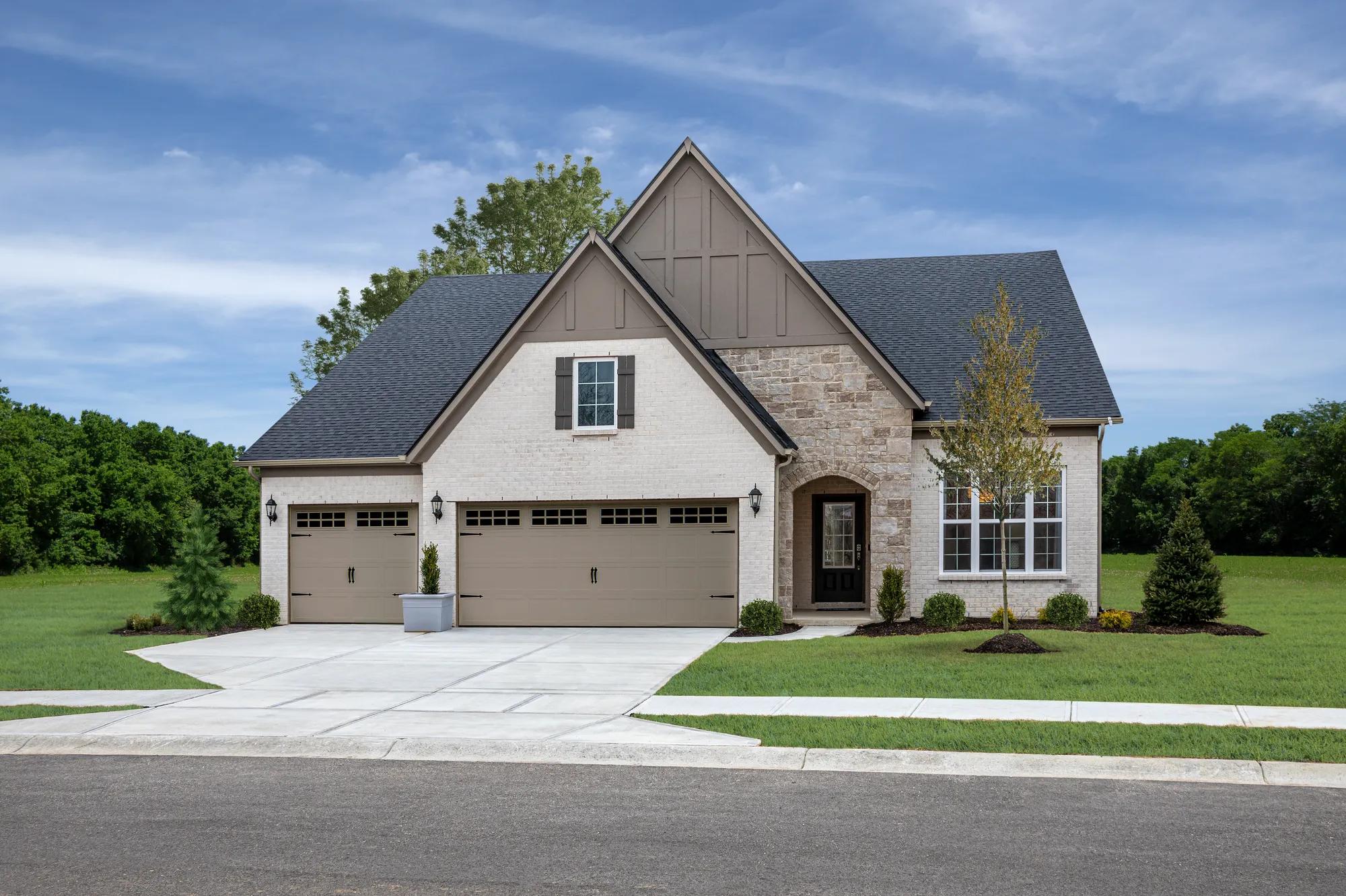 custom home with brick and stone
