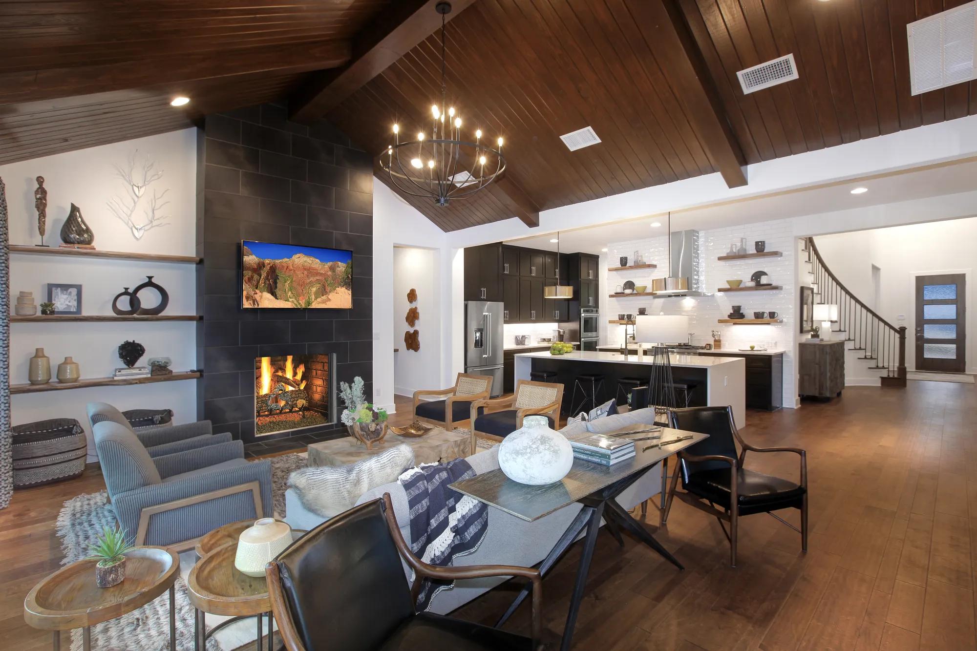 Family room with vaulted ceiling and fireplace