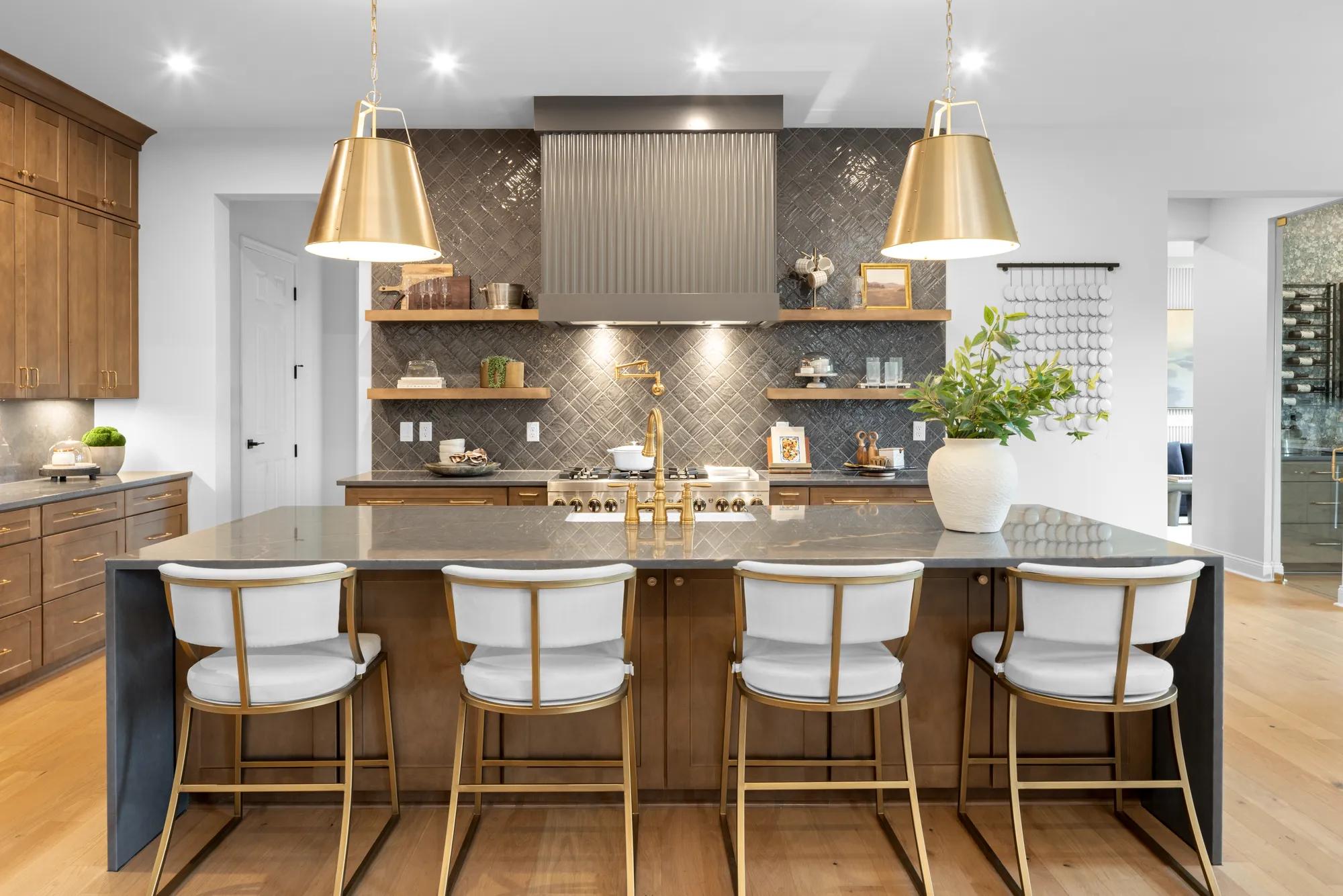 Custom home kitchen with waterfall island and wood floating shelves