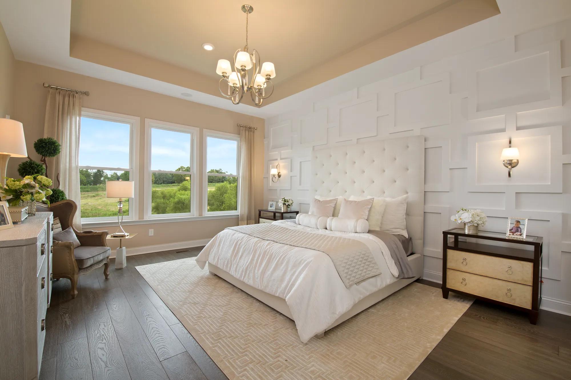 hardwood floor, tray ceiling, bed, wall treatment, window wall